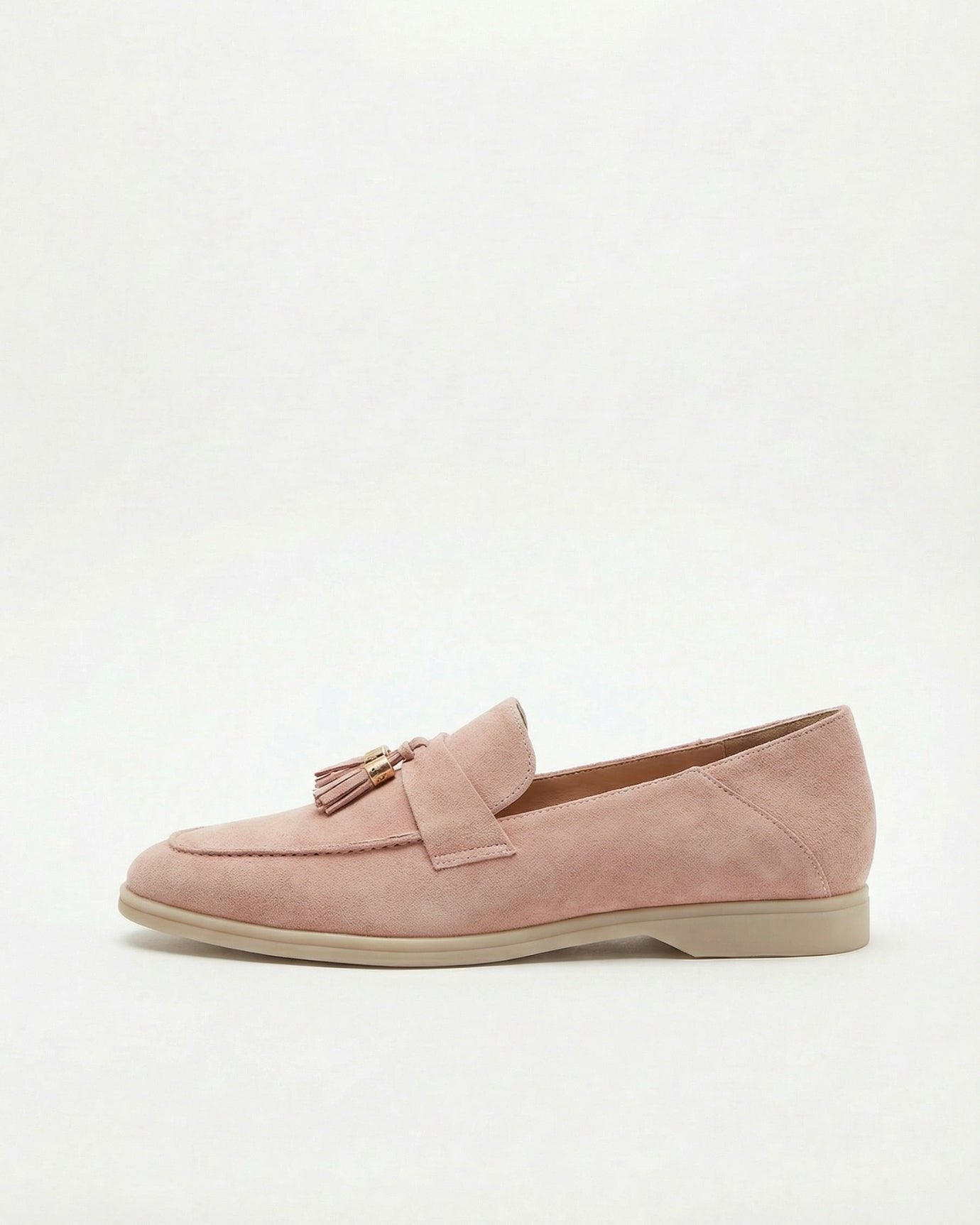Woman with streamlined neutral wardrobe for sophisticated timeless travel style
