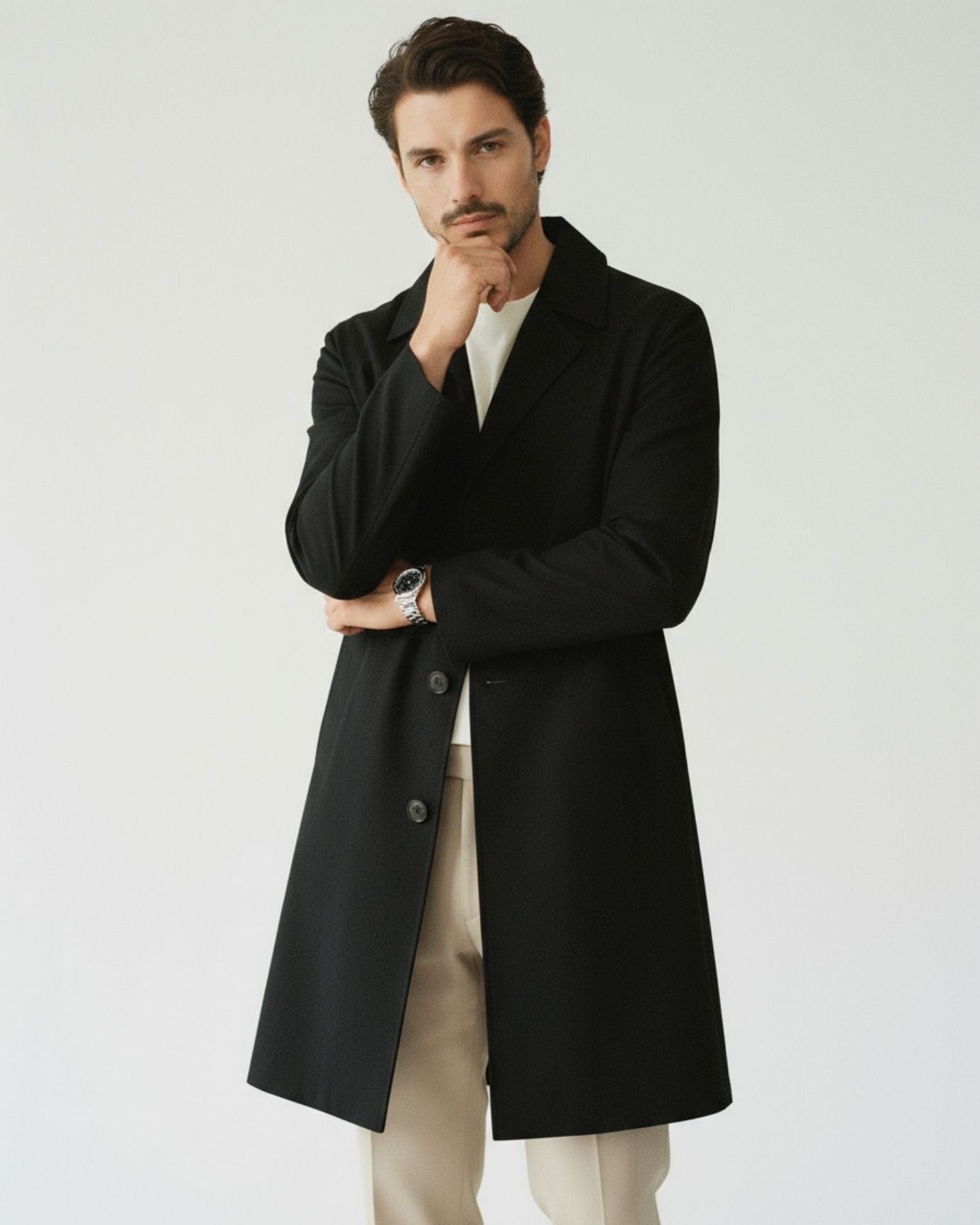 Individual in contemporary minimalist pieces showing quiet luxury and capsule wardrobe foundations