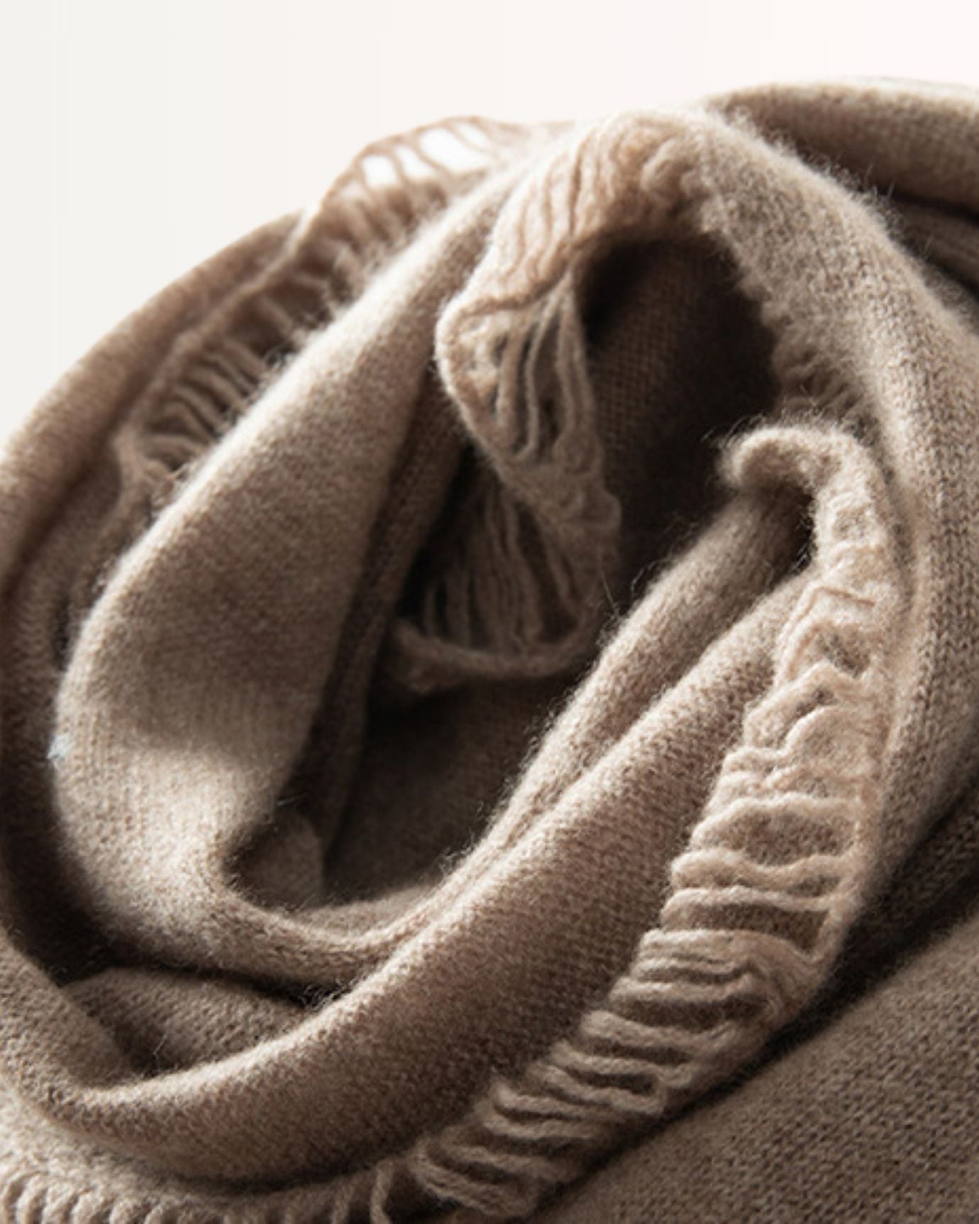 Soft scarf draped over shoulders for elegant evening wear