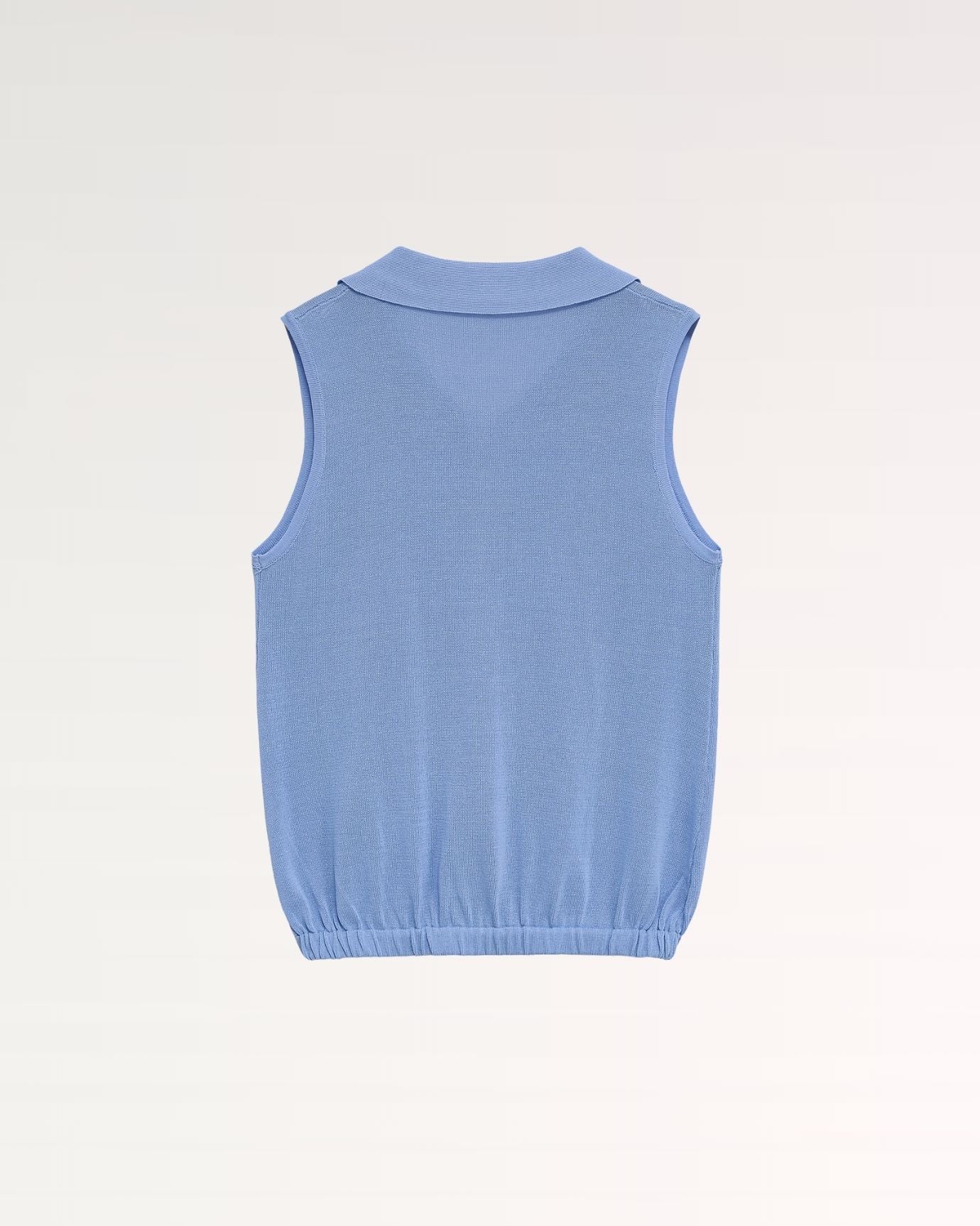 Sandra polo in pastel blue with subtle texture and comfortable fit