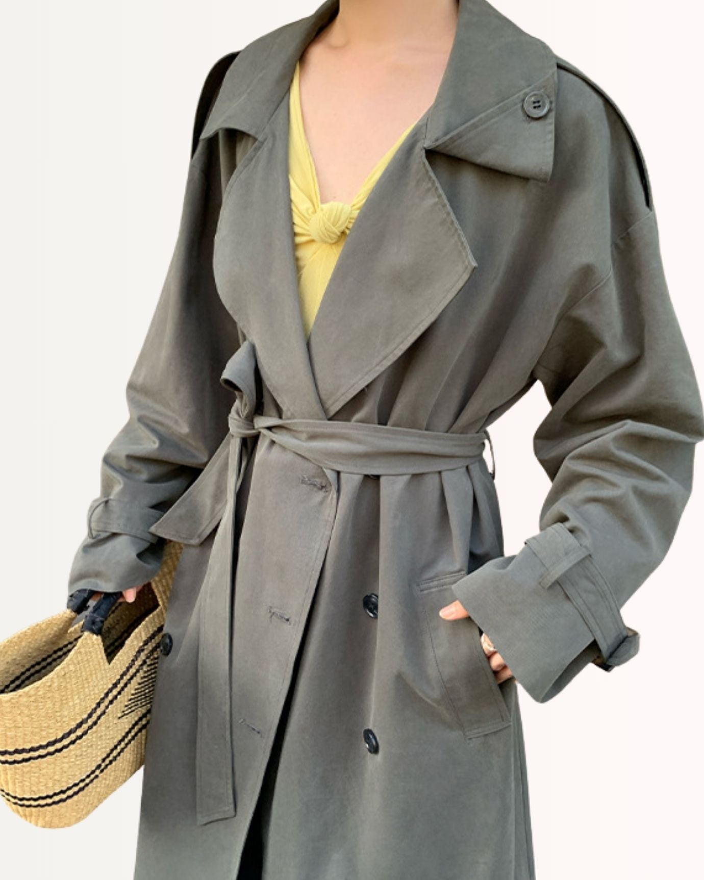 Front view of beige trench coat with belt