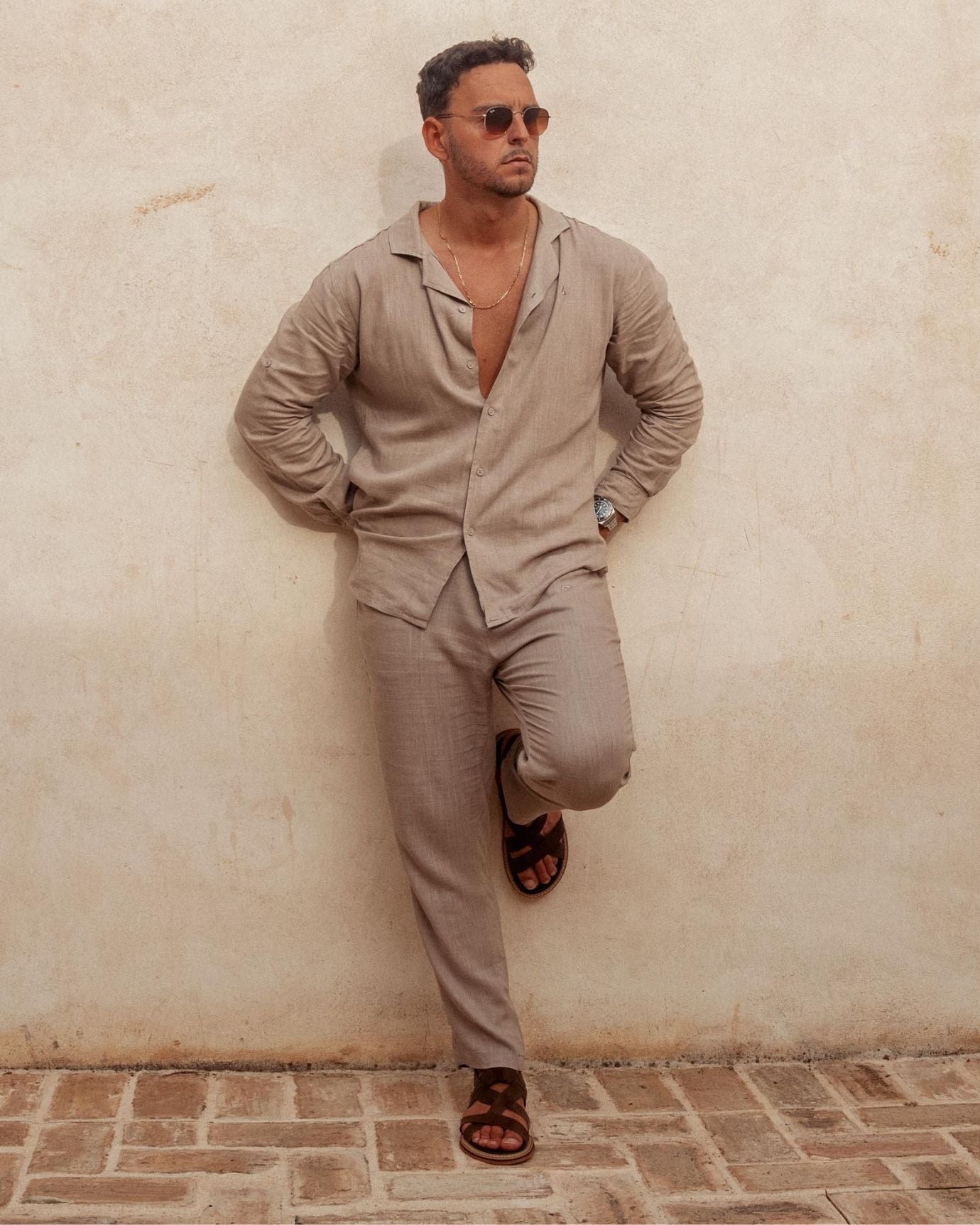 Model wearing relaxed fit Dolce Vita shirt with rolled sleeves