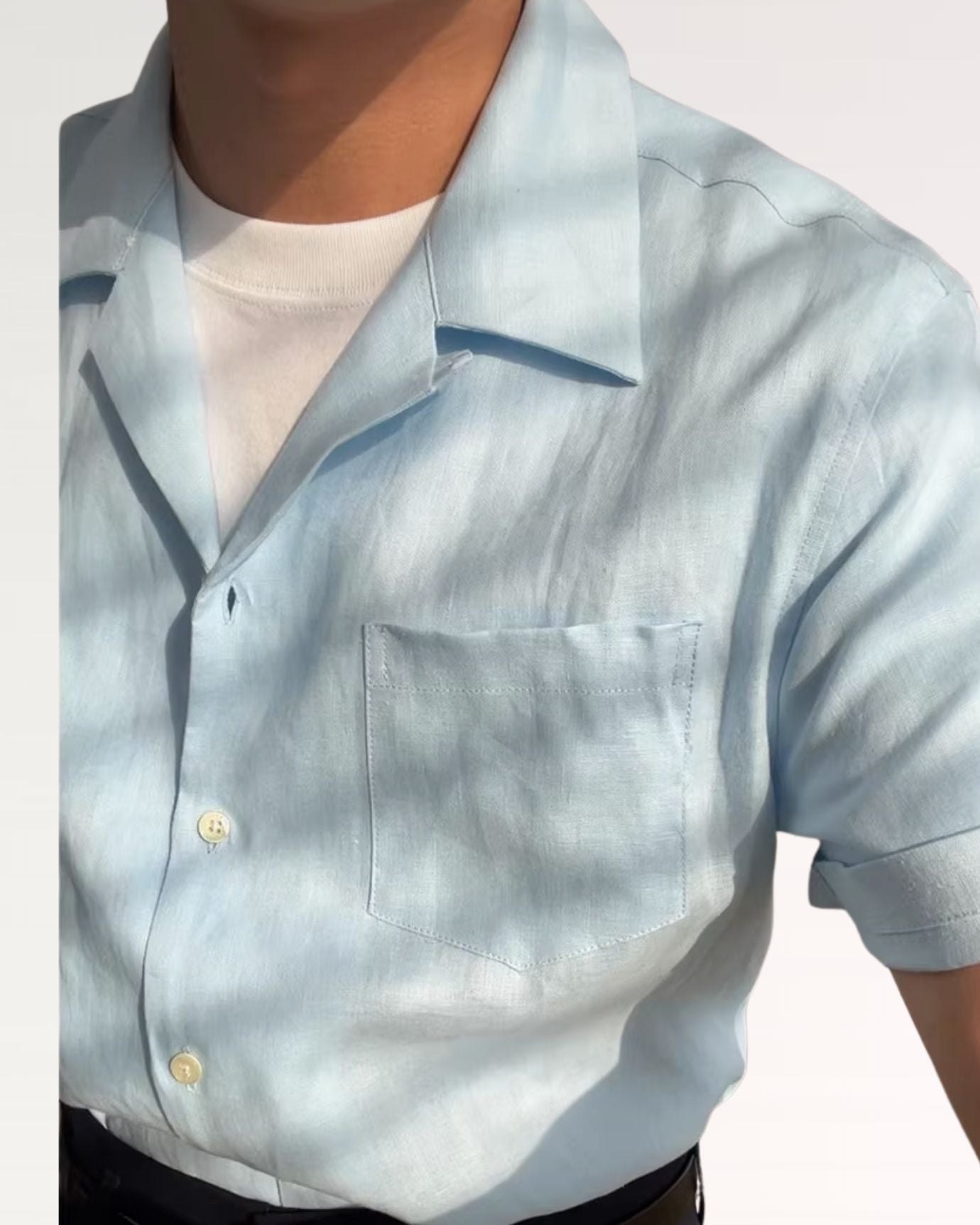 Detail of classic Cuban collar and buttons on Sky Blue linen summer shirt