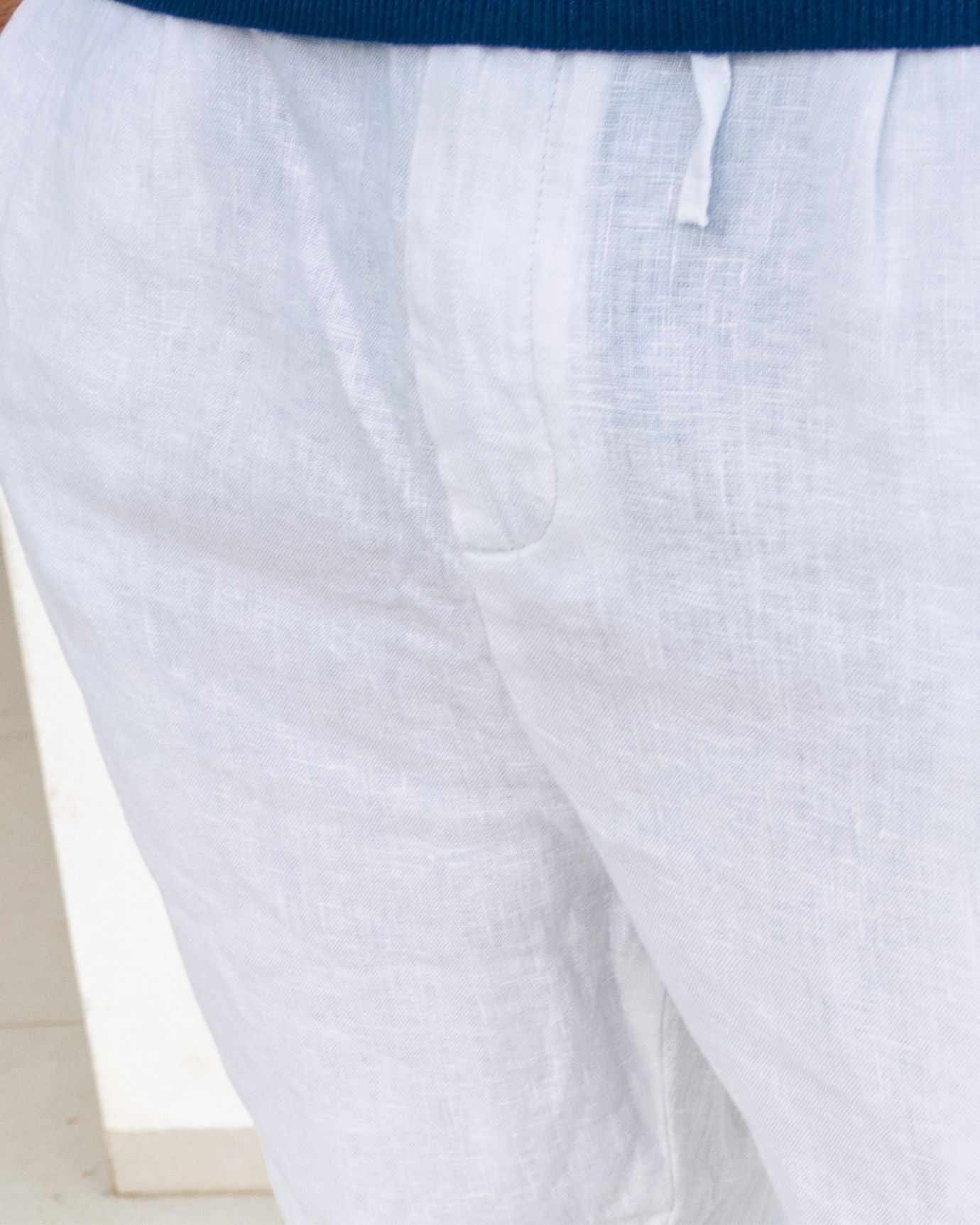 Stylish white linen trousers from the Ibiza Vice limited edition collection, perfect for summer
