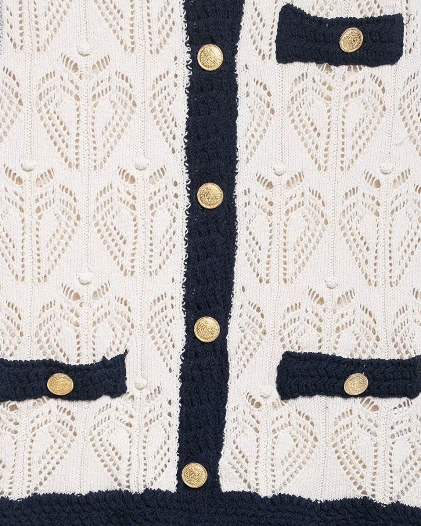 Sleeveless vest showcasing detailed jacquard pattern and airy mesh fabric integration
