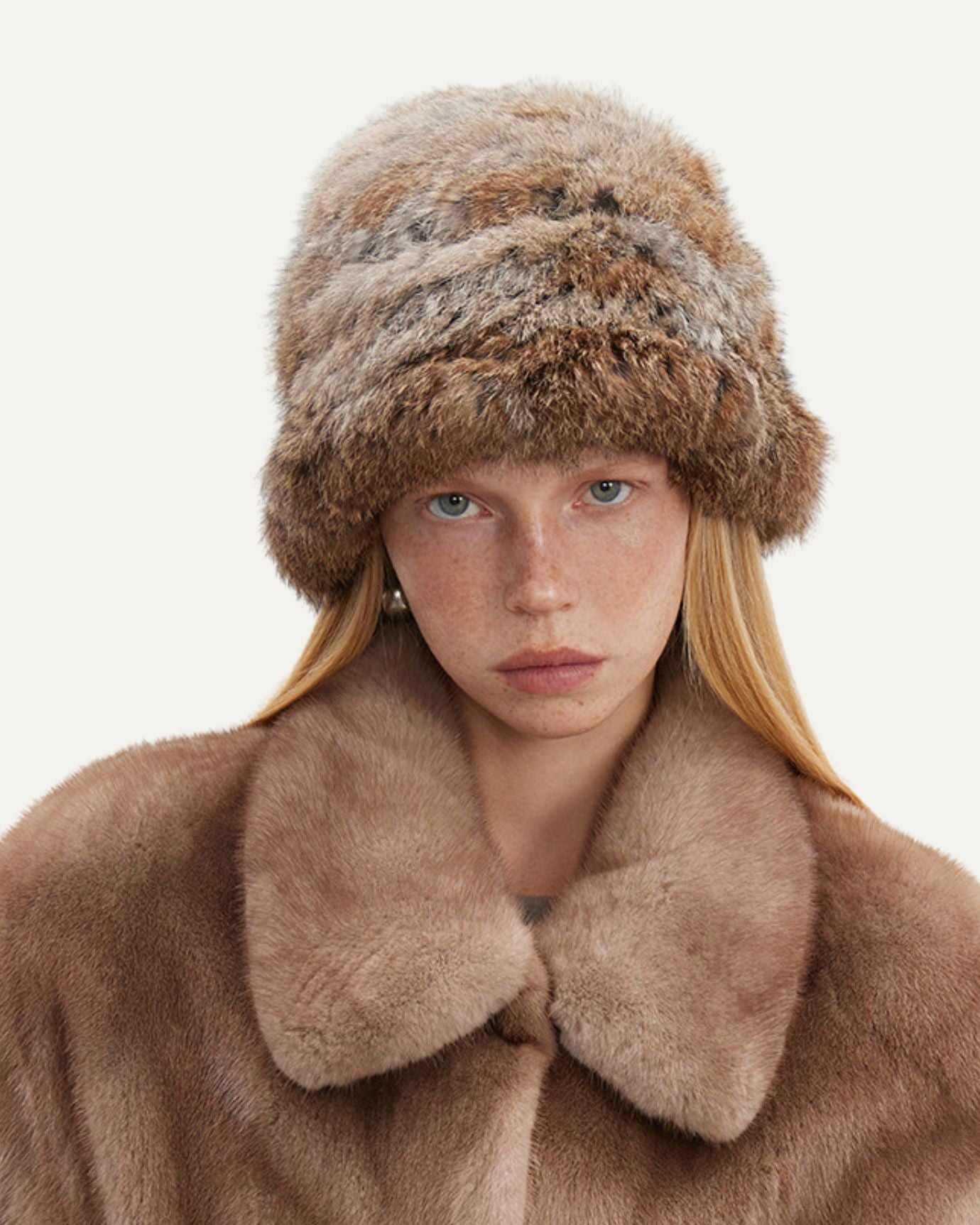 Model wearing Rabbit Fur Designer Hat styled for high-fashion winter looks