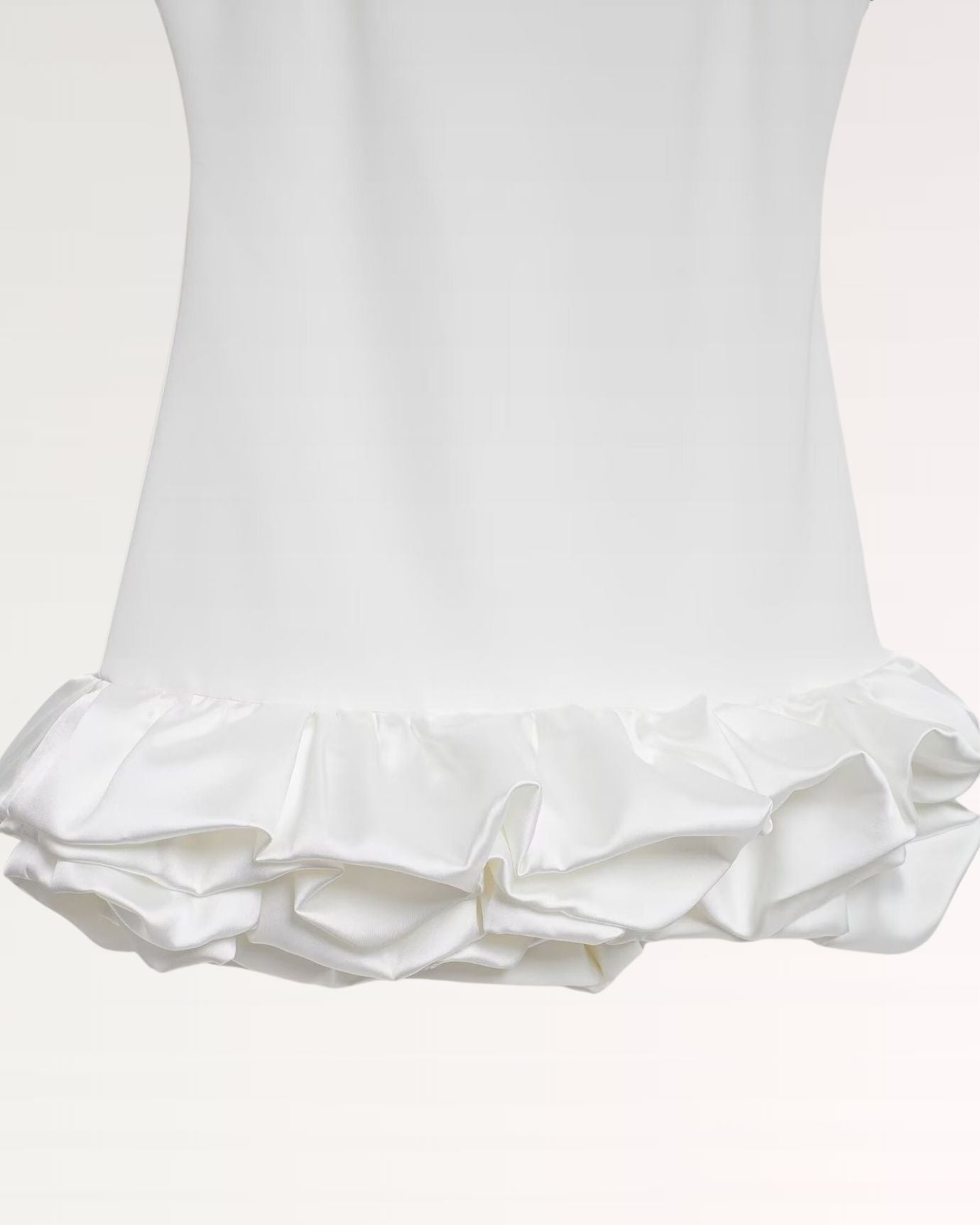 Detailed shot of Loose Dress Pleated hem and pleat precision