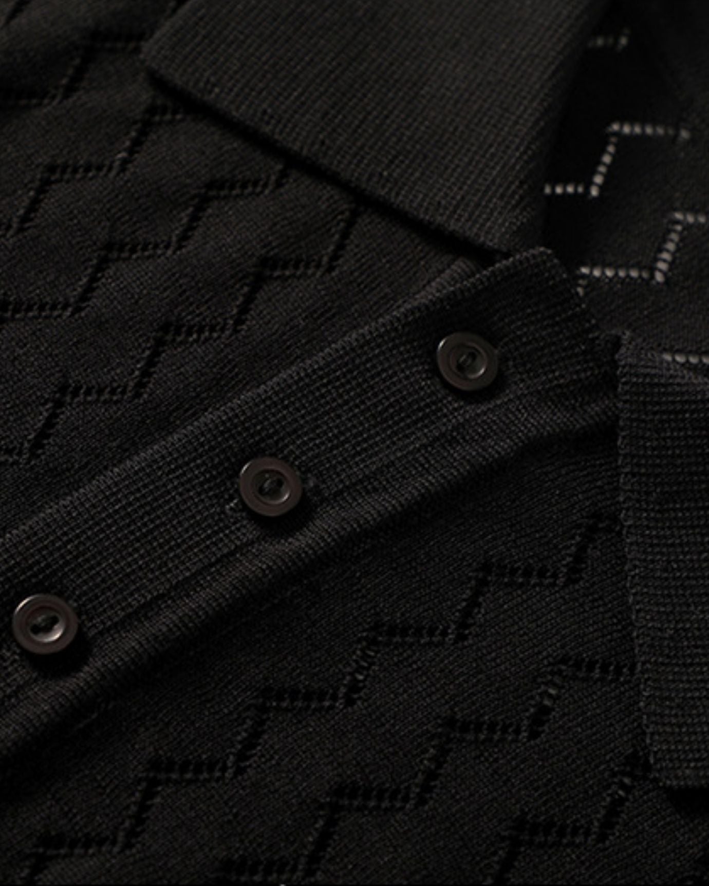 Detail of collar and smooth knit texture on Black silk cashmere polo