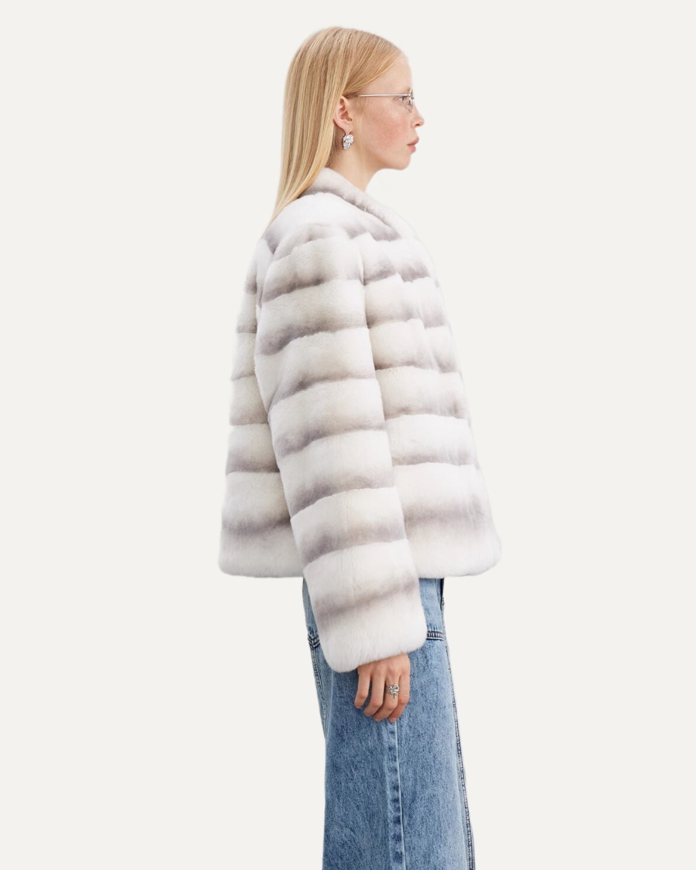 Streetwear-inspired look with rabbit coat and oversized scarf