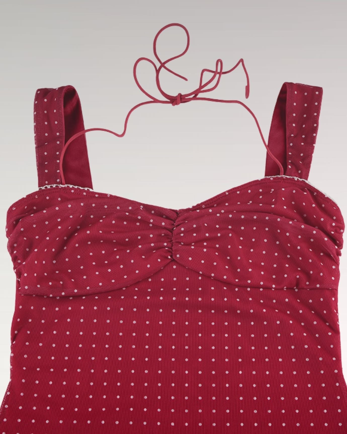 Front view of Frenchie Dot Dress with fitted waist and flared skirt