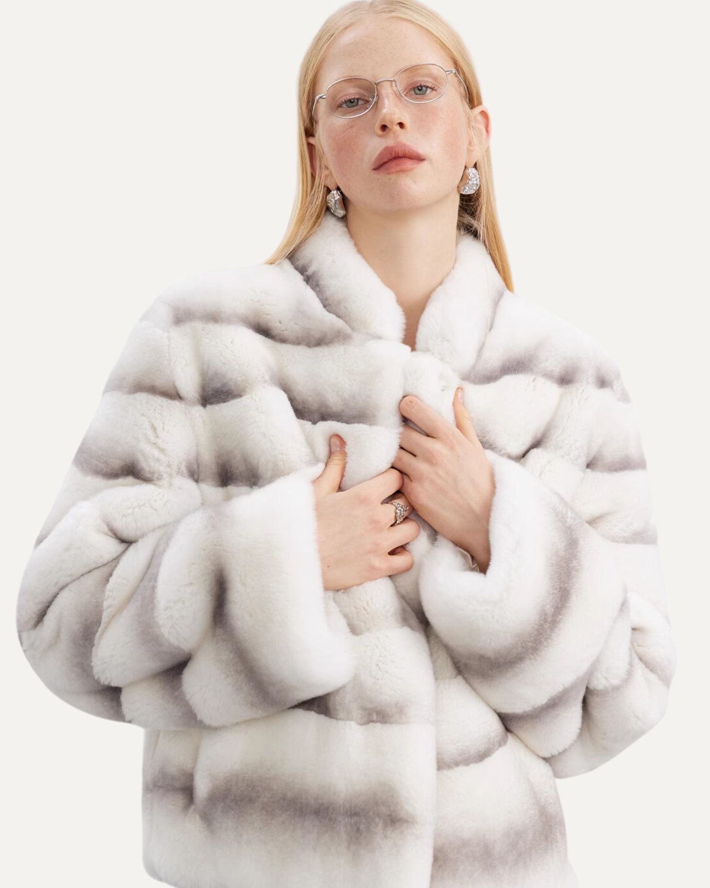Designer rabbit coat with oversized silhouette and plush texture
