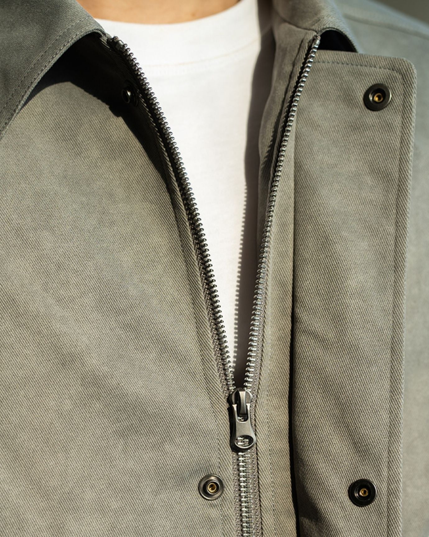 Folded Crush Jacket showing premium fabric quality and color