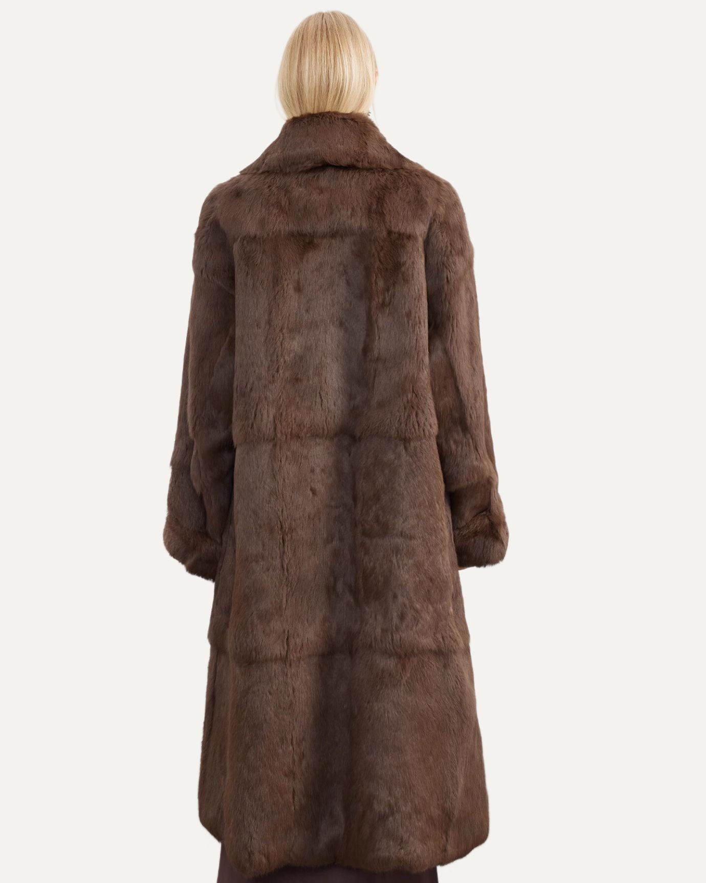Elegant evening look with rabbit coat and silk dress