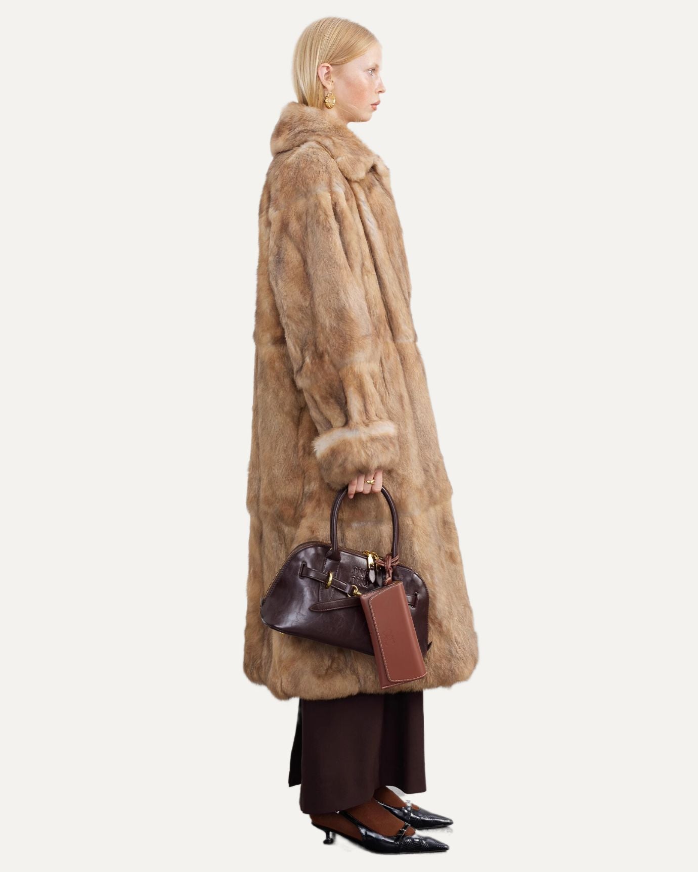 Luxury rabbit coat with retro silhouette – campaign highlight