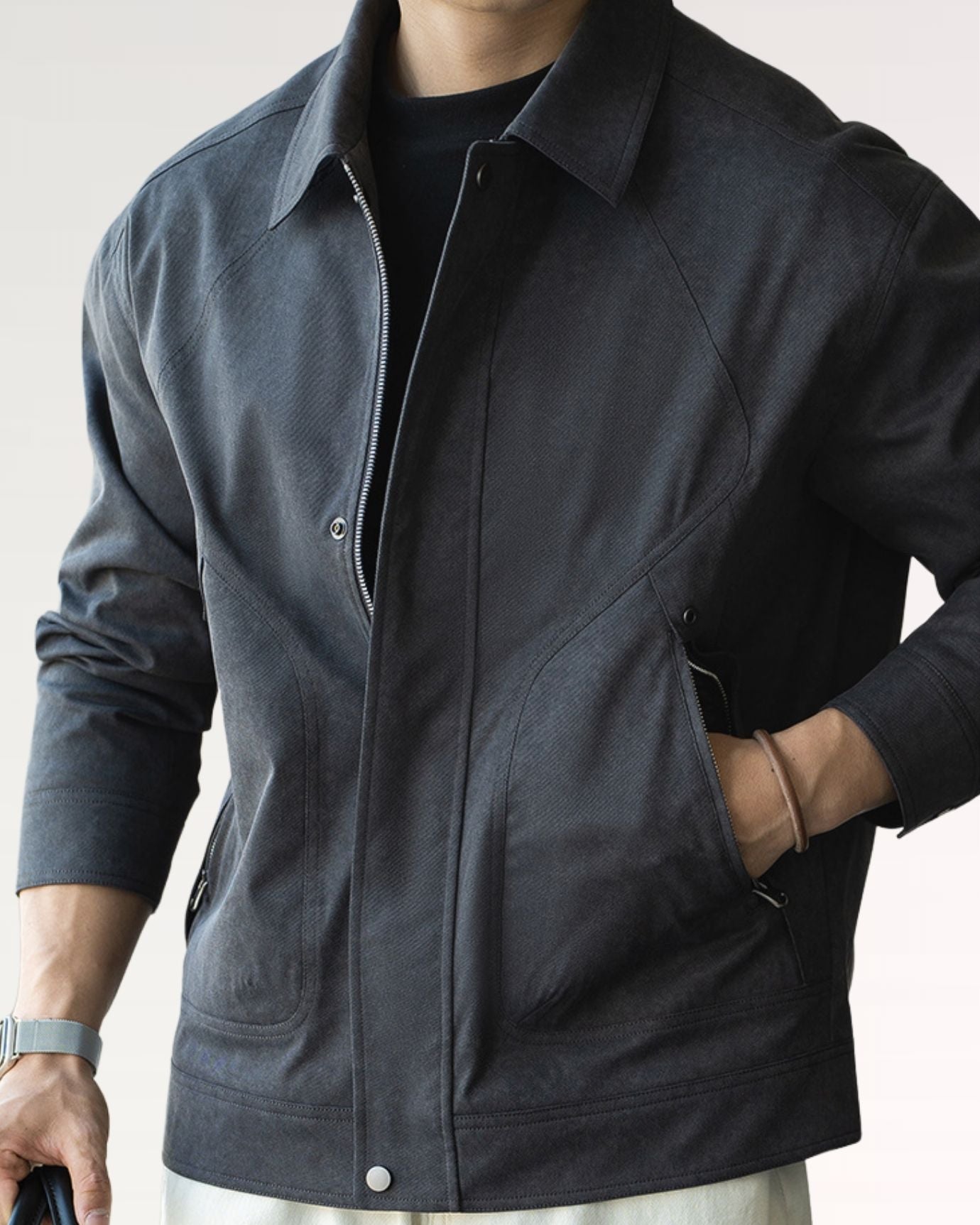 Close-up of Crush Jacket zipper on pocket and fine fabric texture