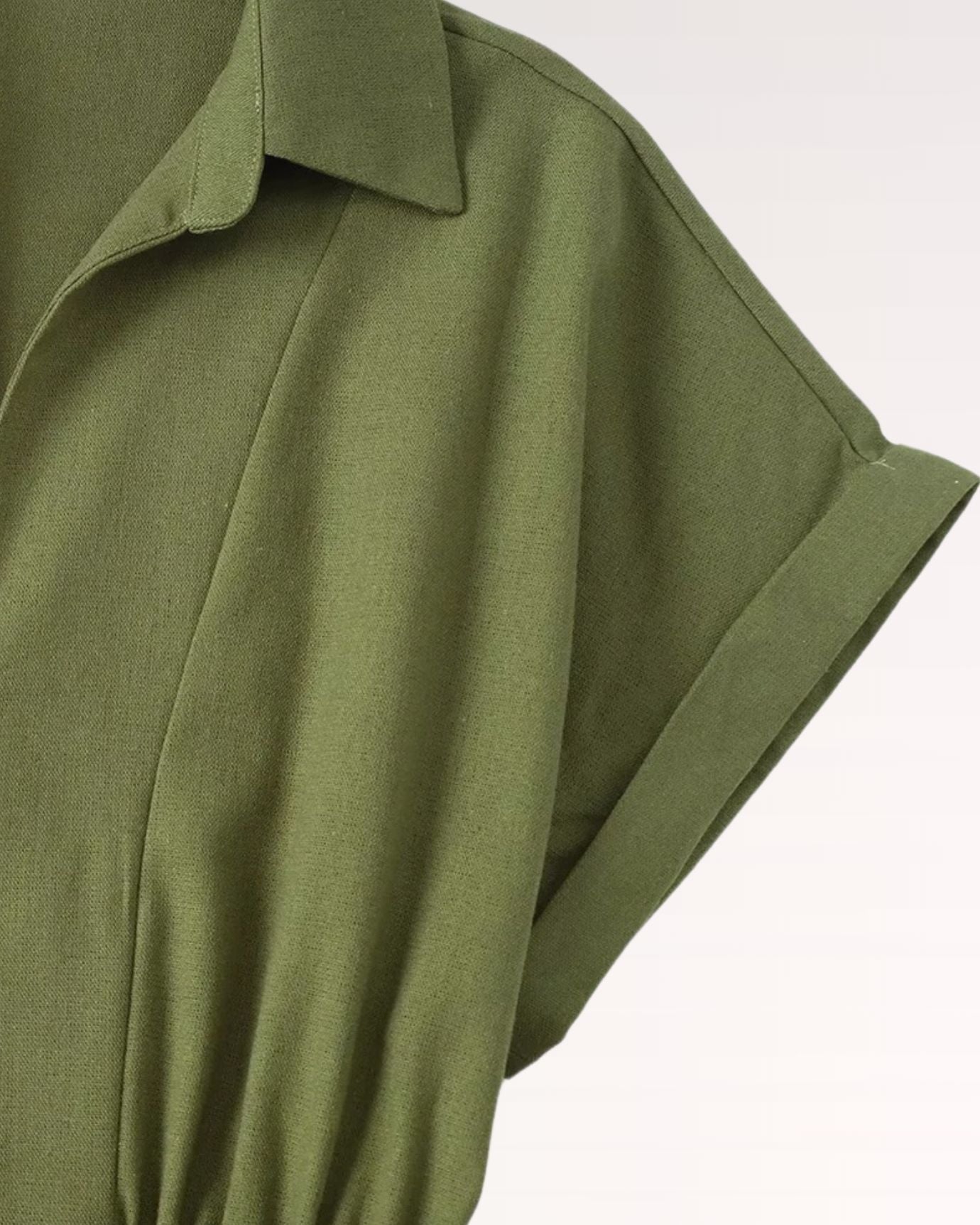 Sleeveless village waist dress with gentle pleats and floor-length hem