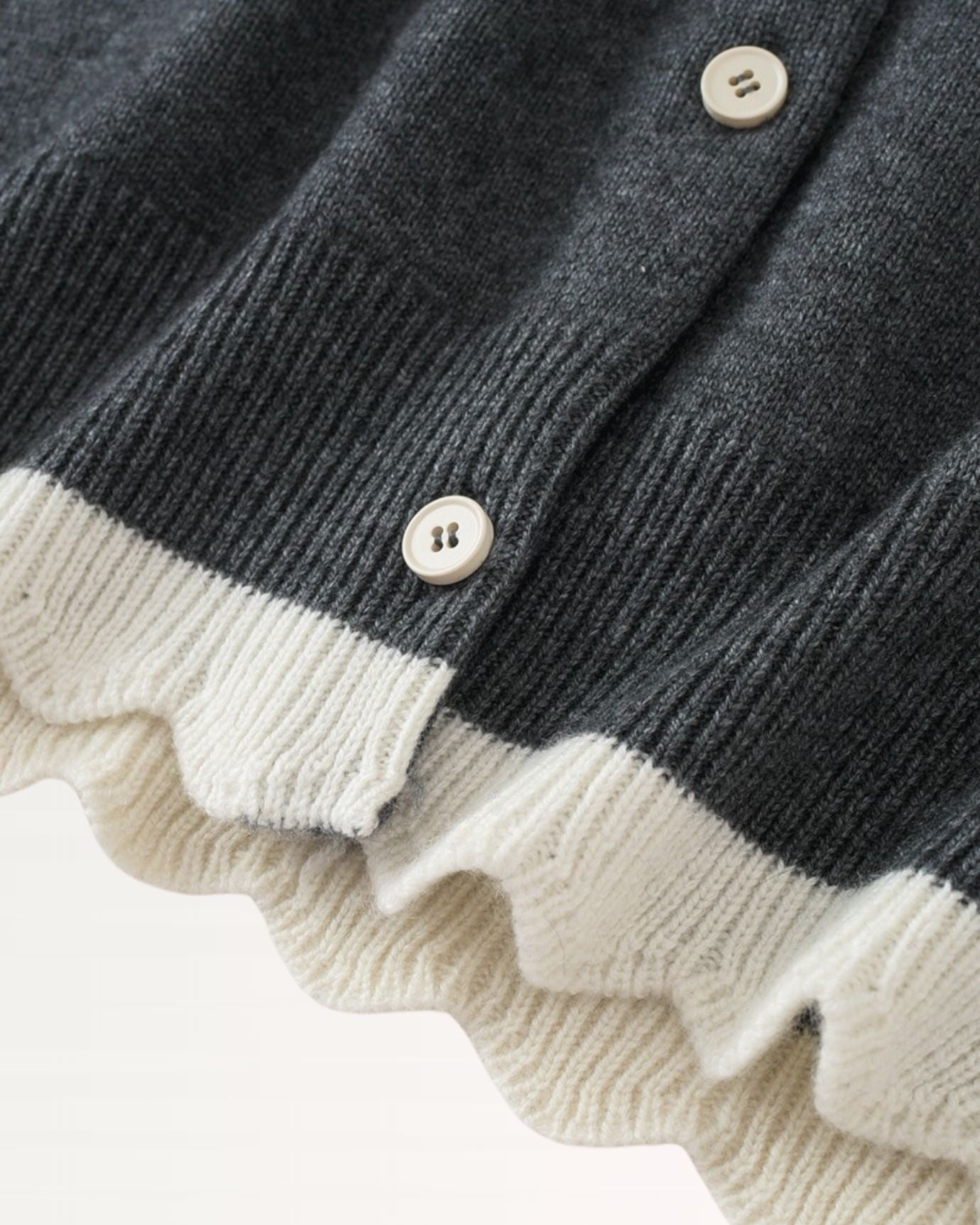 Detail of cashmere fabric texture on cardigan coat