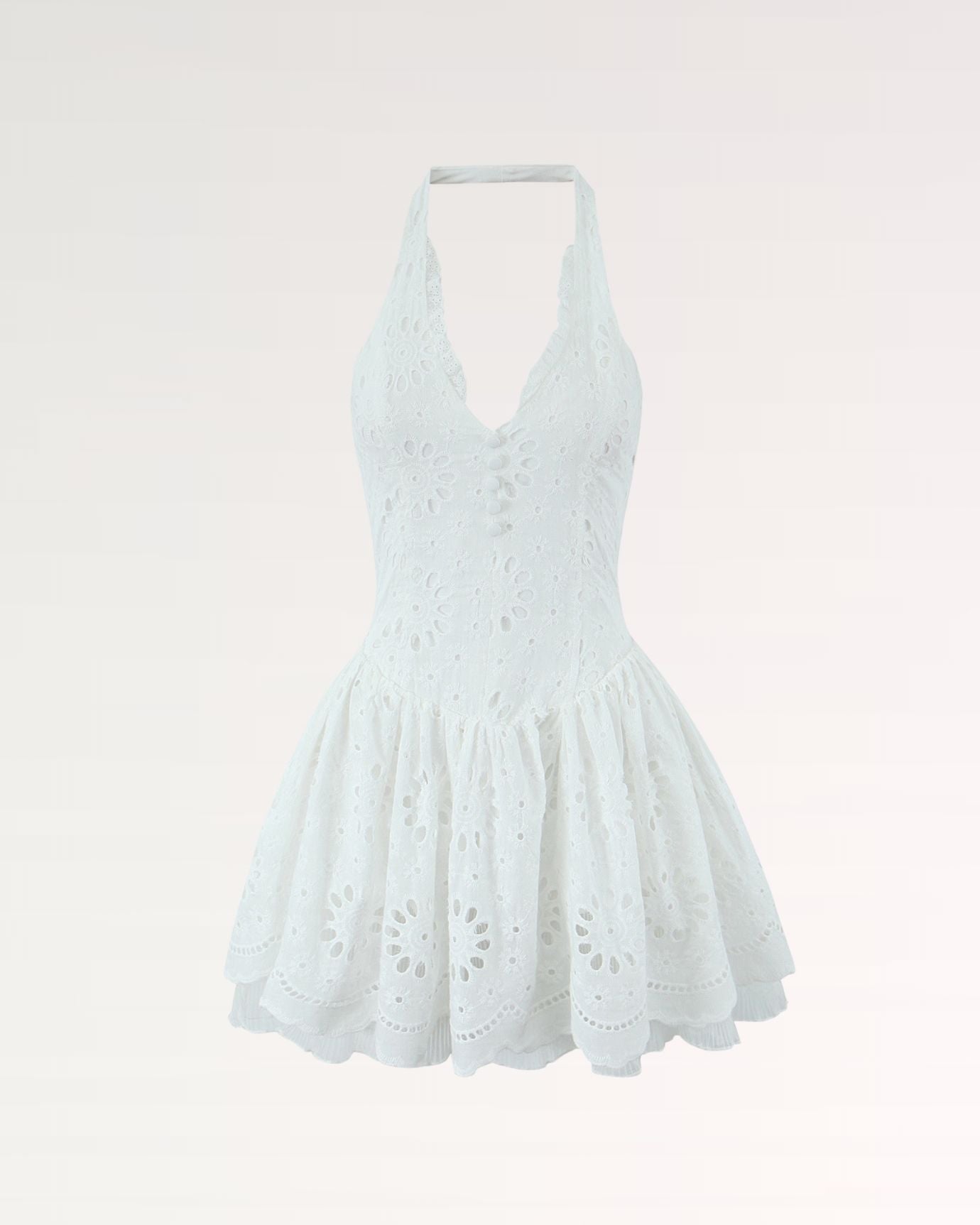Feminine white embroidered dress perfect for weddings or formal events