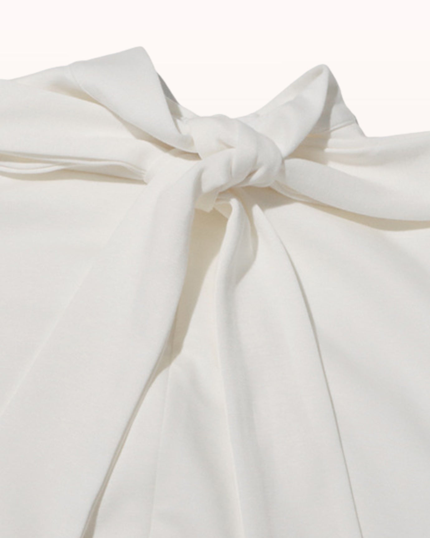 Vestido de punto con chaleco floral dimensional