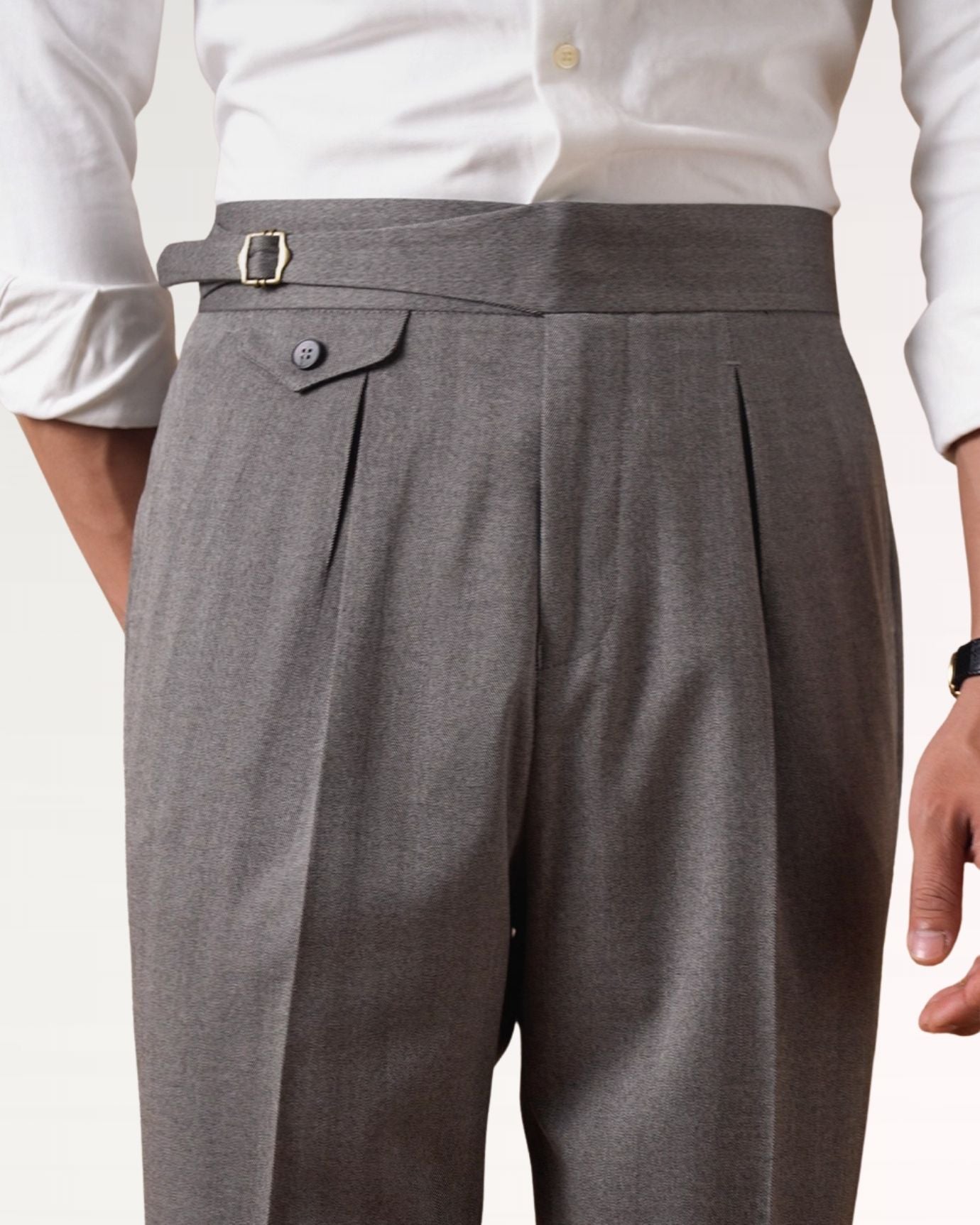 Dress trousers with refined tailoring and classic herringbone weave texture
