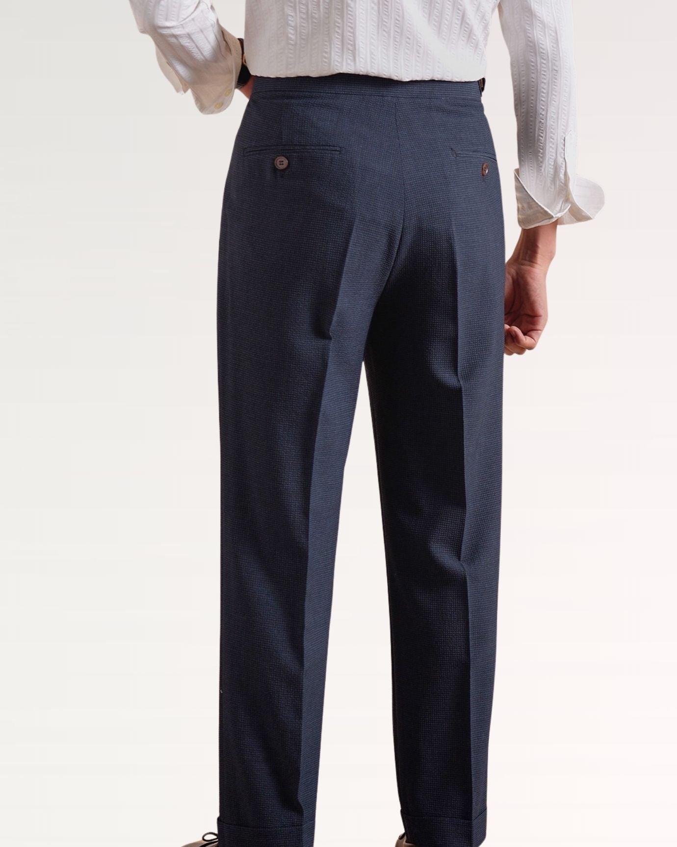 Back of business casual trousers showing clean seams and functional pockets