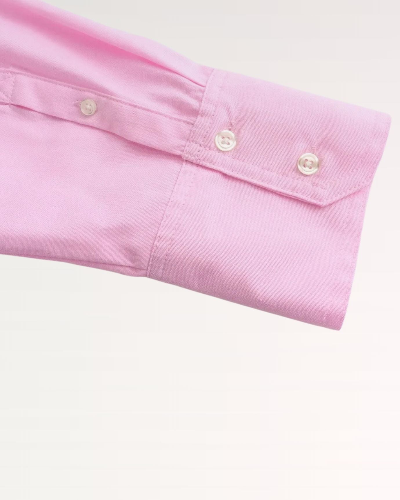 detailed image of mother of pearl buttons on oxford shirt