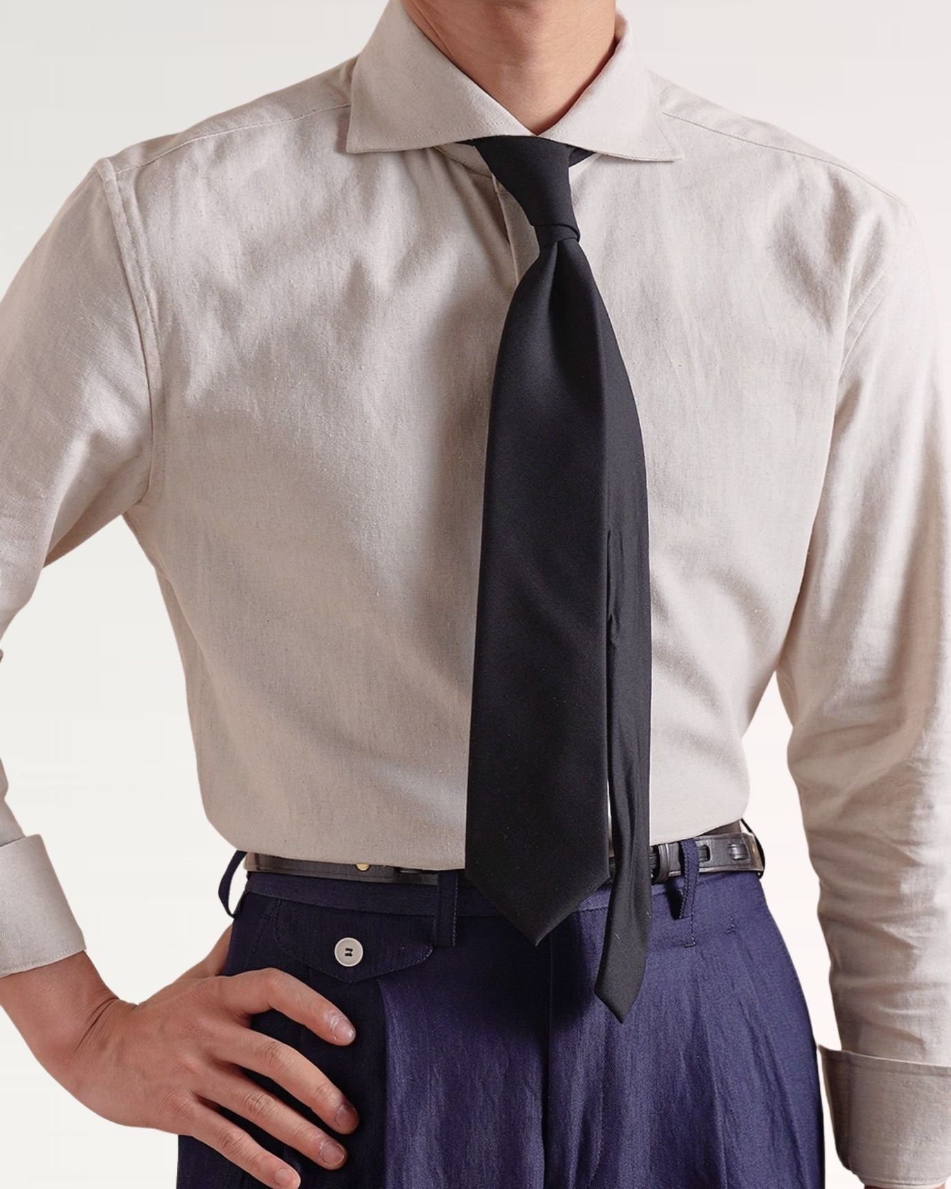 Front view of Italian linen shirt featuring button-down closure and relaxed fit