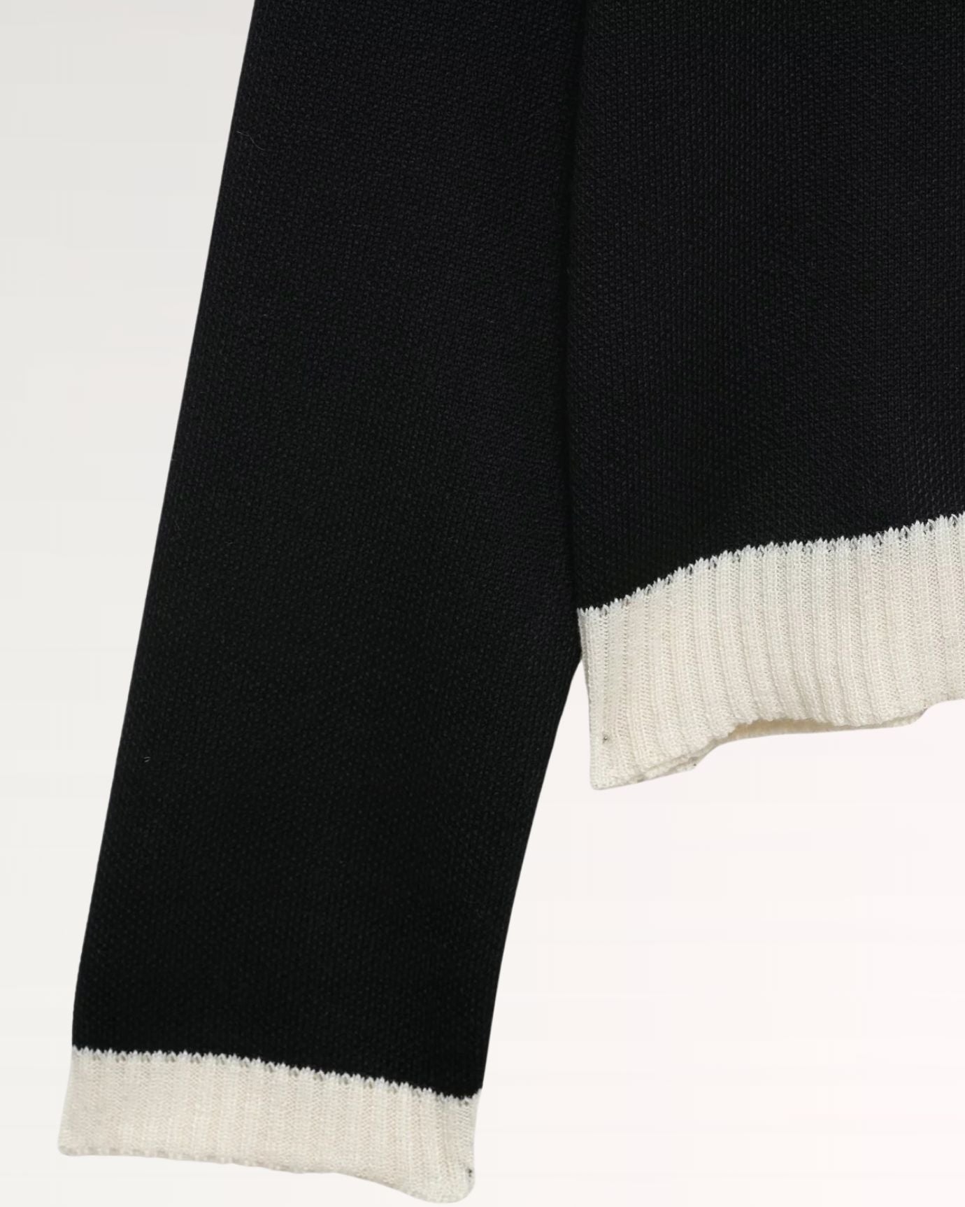 Old Money style cardigan with neat collar and reinforced shoulder seams