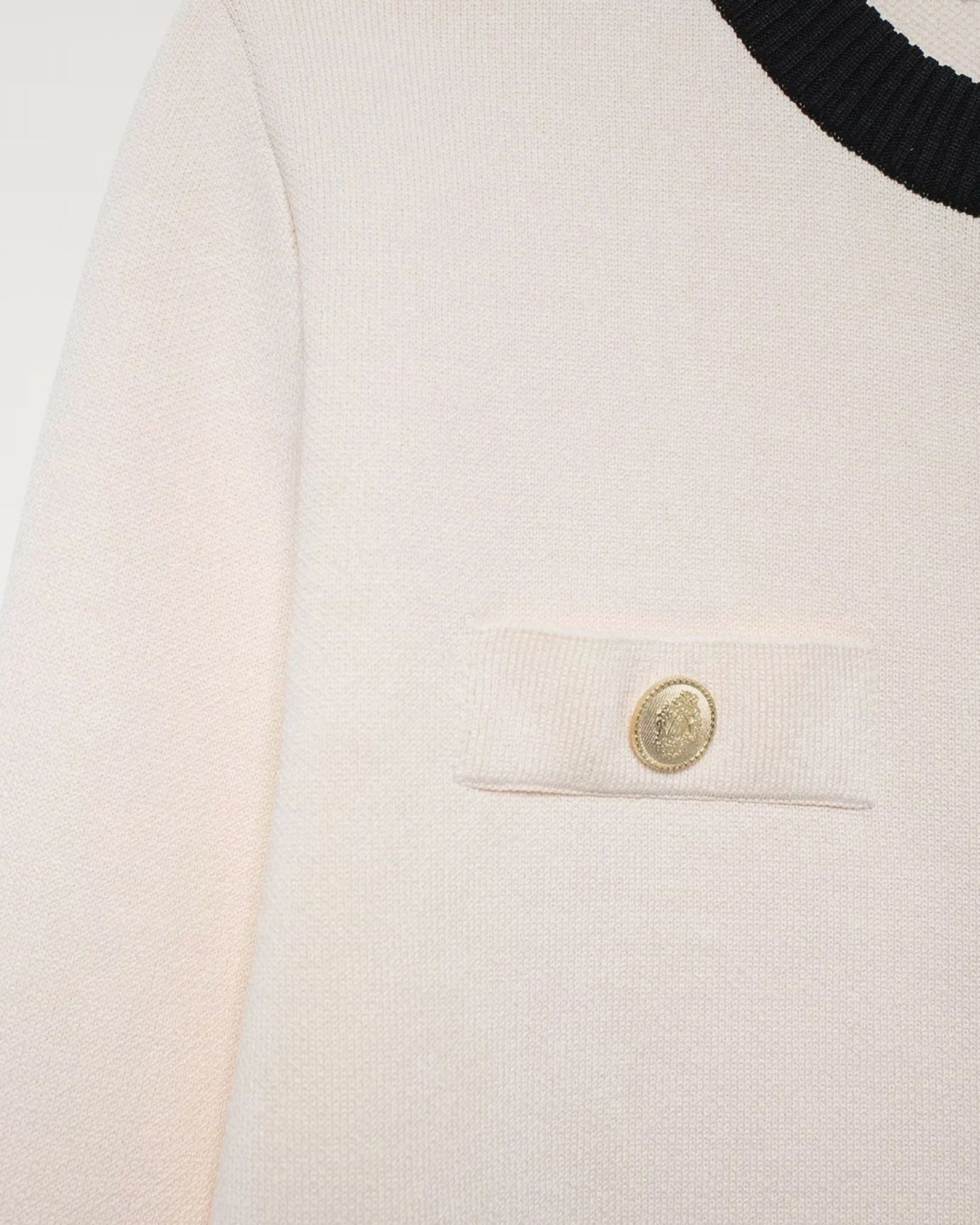 Franziska cardigan showcasing smooth texture and ribbed trim detail