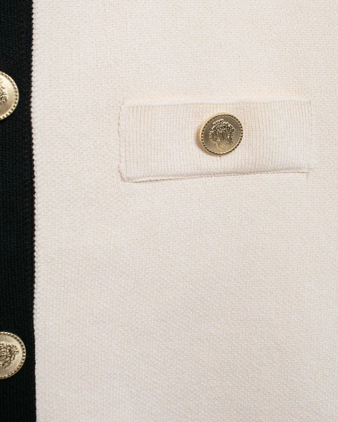 Elegant fine knit cardigan with softly tailored fit and front buttons