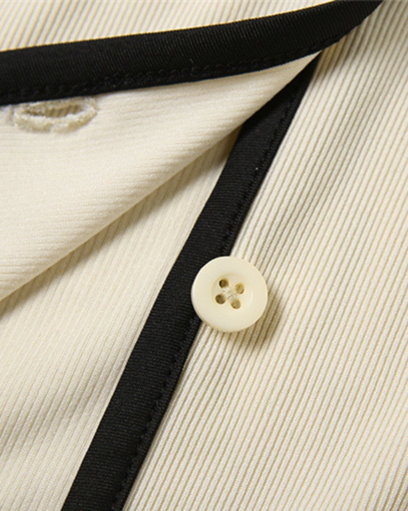 Close-up of Milano set buttons and finishing showcasing craftsmanship