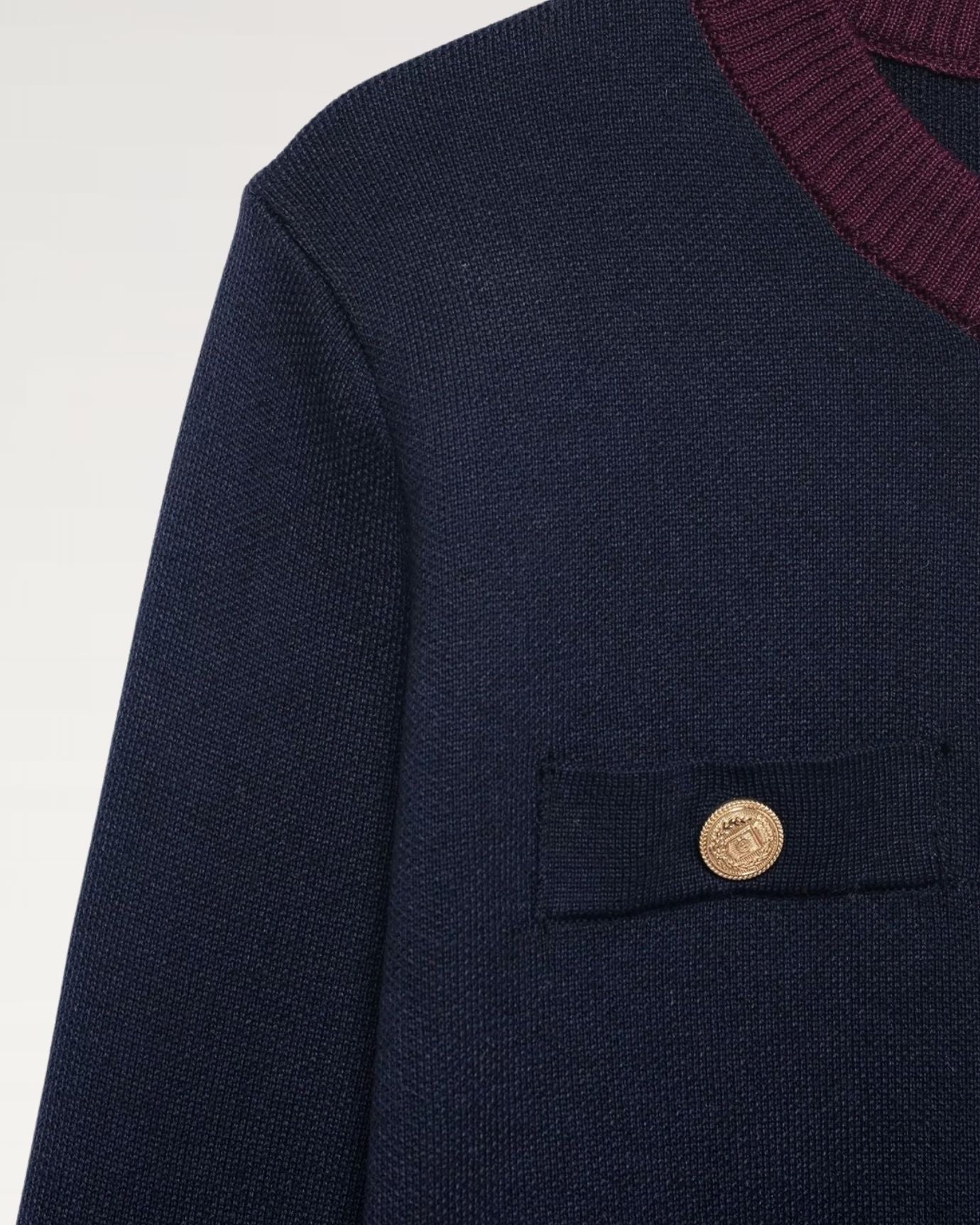 Wool blend cardigan with refined tailoring and ribbed edges for comfort