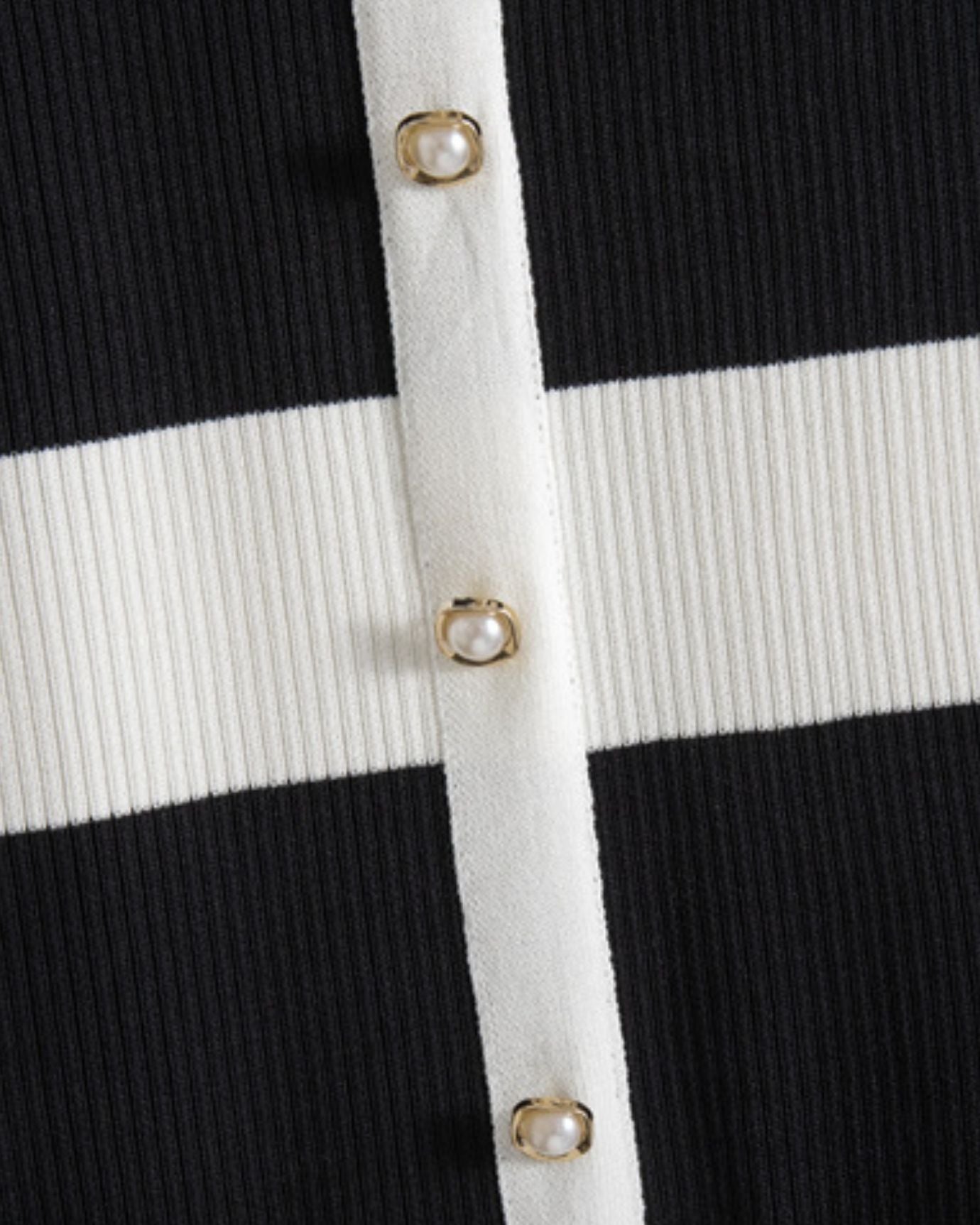Close-up of elegant buttons detail on the front of Old Money Ice Silk Dress Short Sleeve in Black
