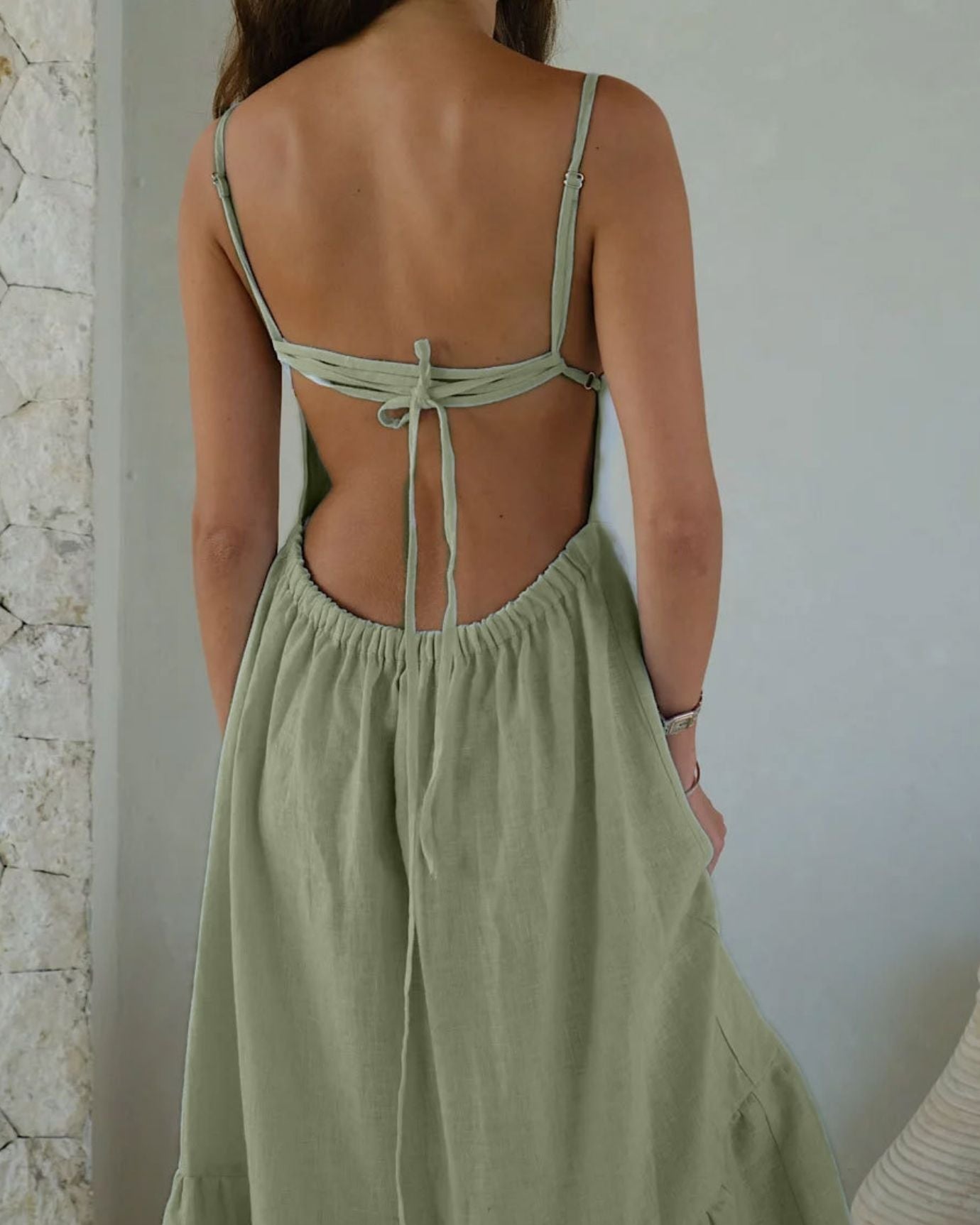 Casual light green Rhi suspender dress featuring a soft fabric and relaxed fit