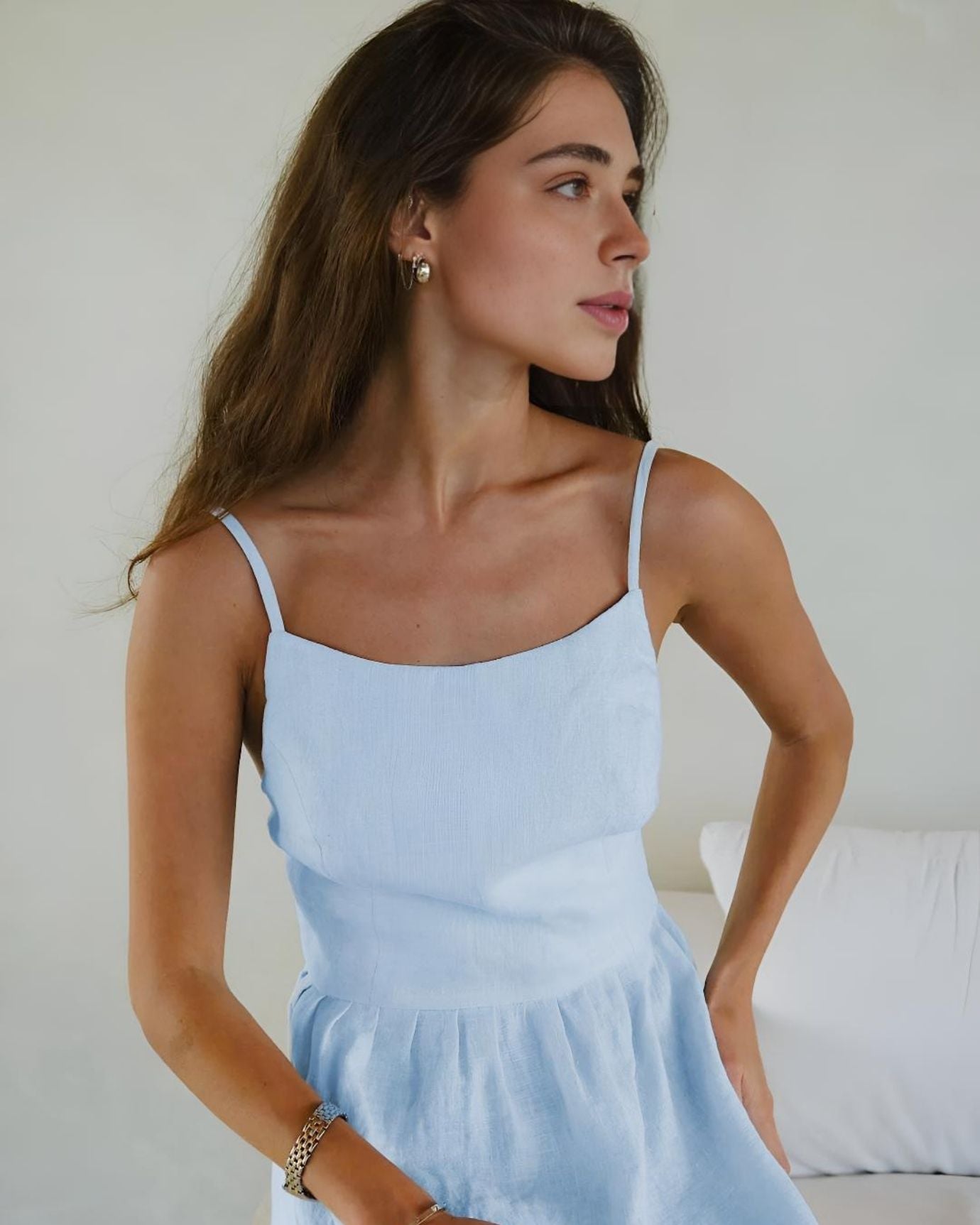 Women's light blue Rhi suspender dress with a knee-length cut and comfortable fit