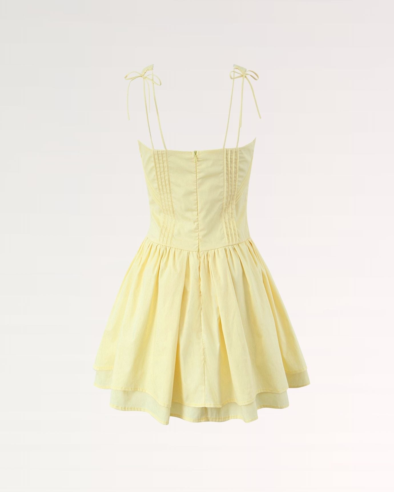 Front view of Yellow Mini Suspender Dress with bright, vibrant color