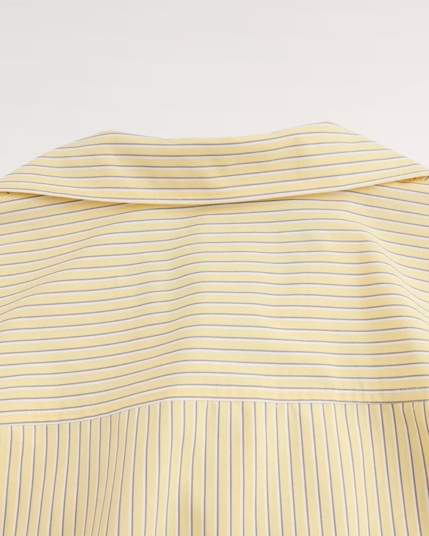 Back view emphasizing clean lines and breathable fabric weave