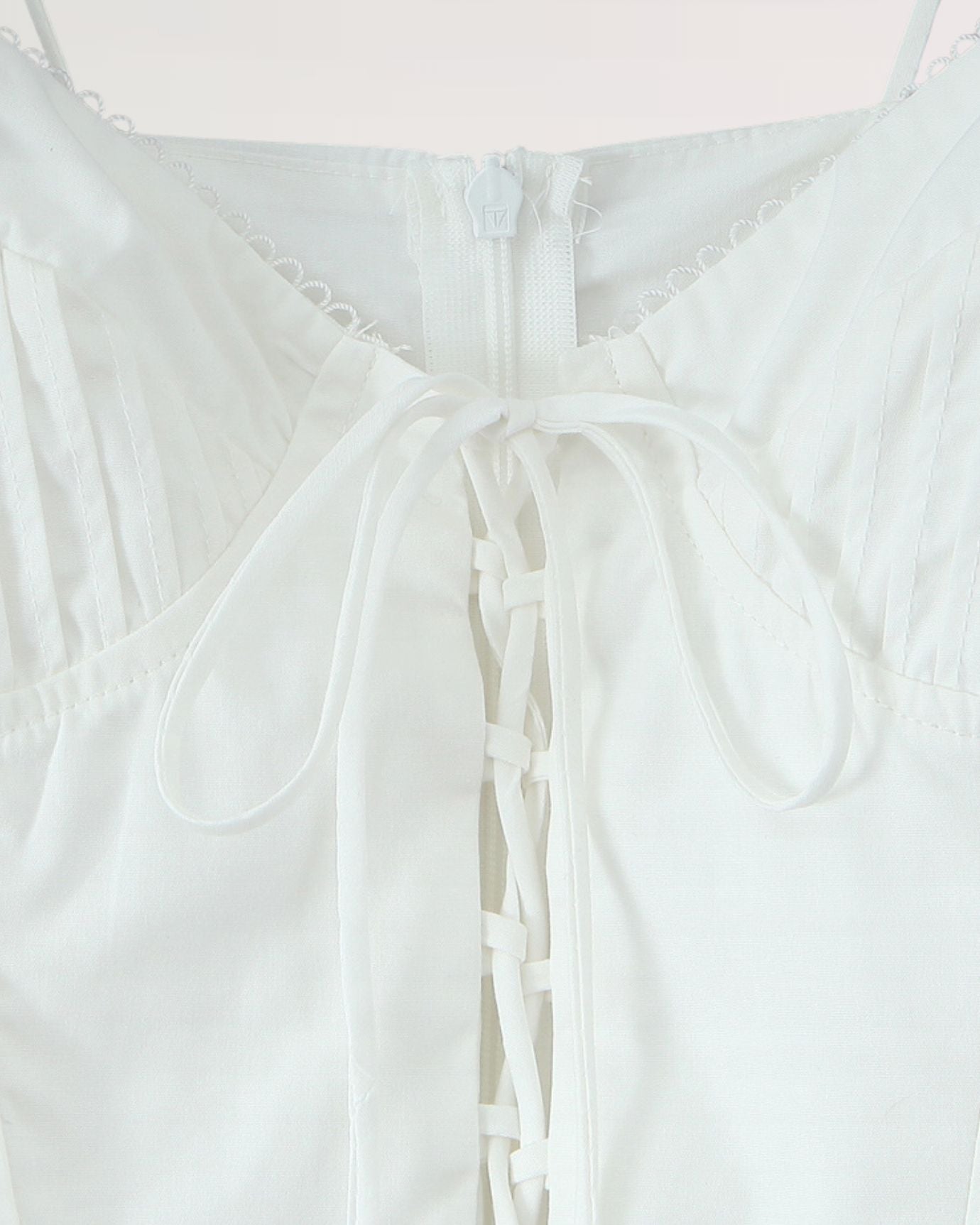 Detail of suspenders and fabric texture on Yellow Mini Dress White Color