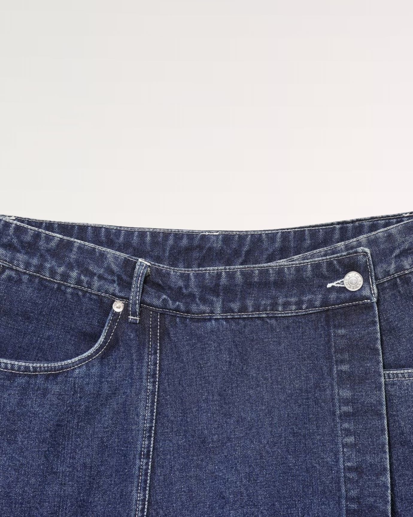 Navy blue denim skirt with classic five-pocket design