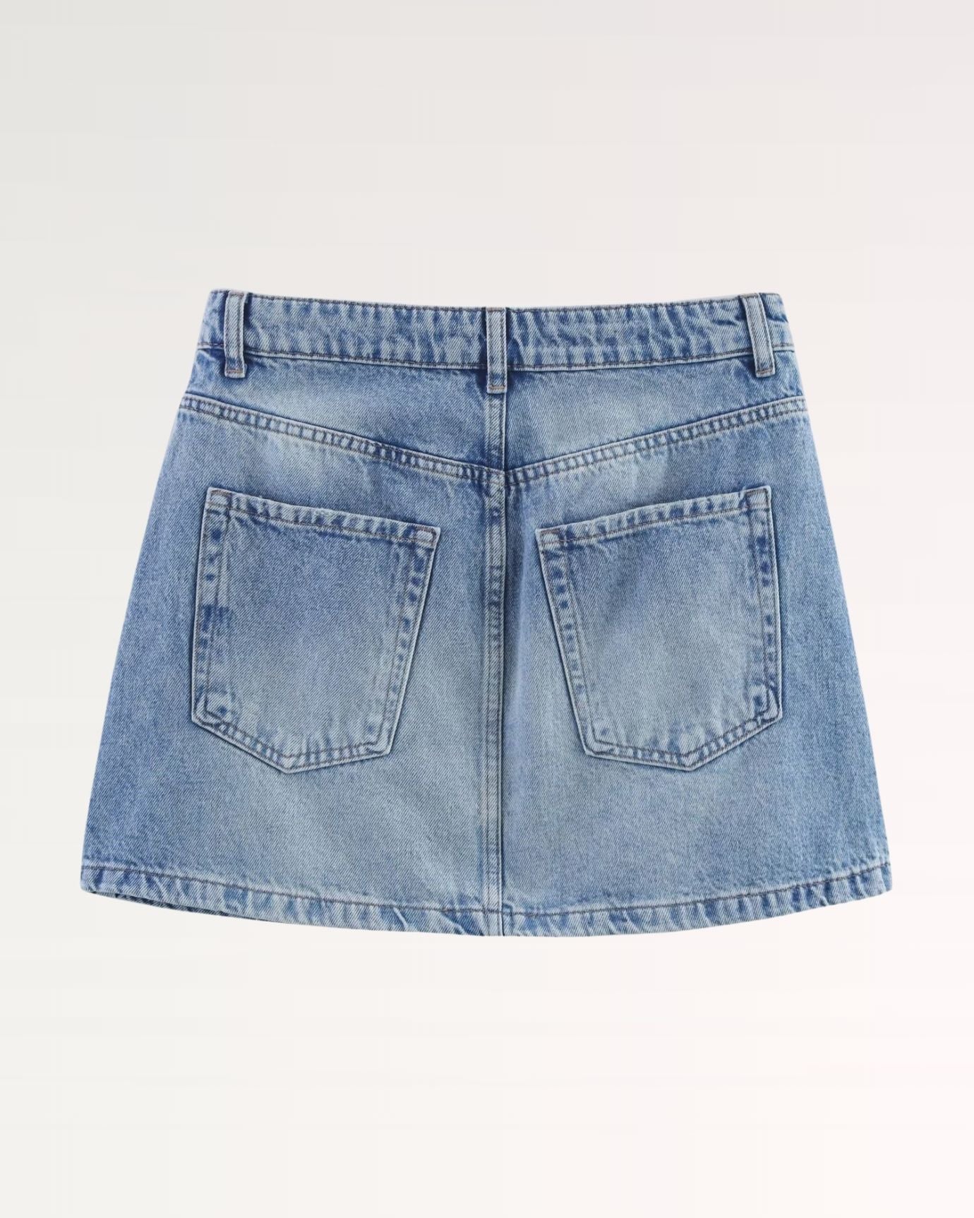 Casual distressed denim skirt with faux leather logo patch