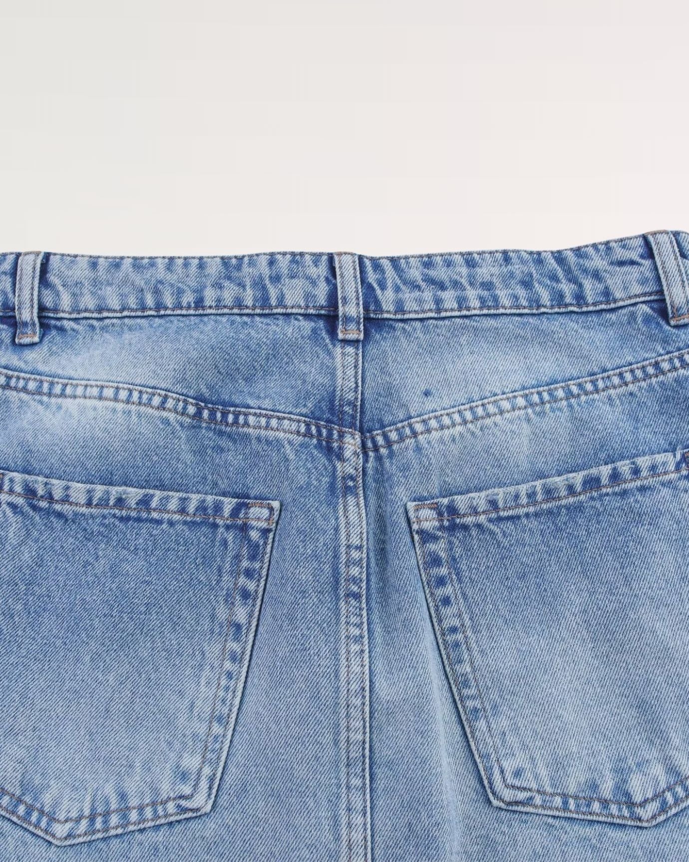 Lira skirt featuring rugged, worn-in texture