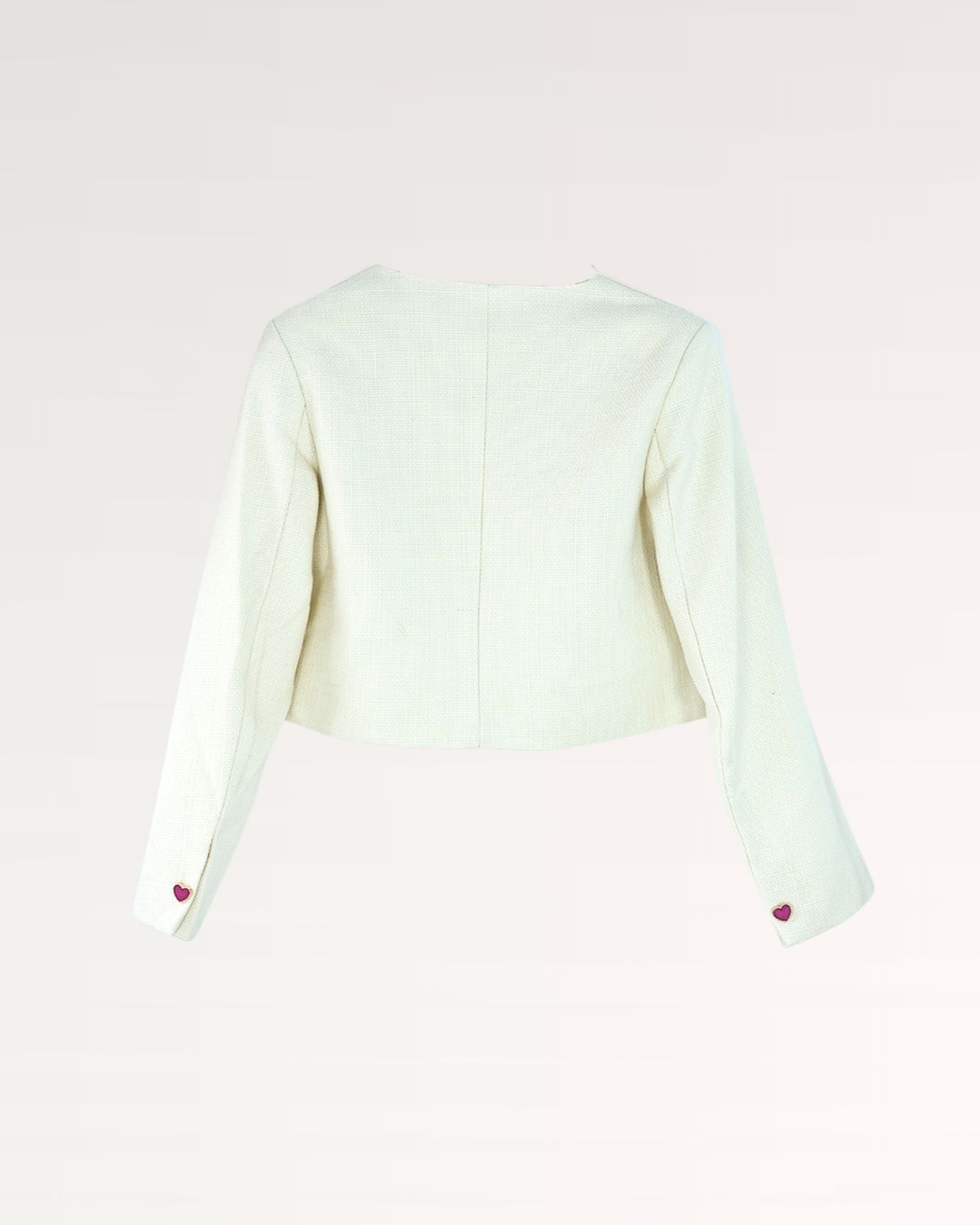 Back view of Lovau Heart Round Jacket showcasing heart motif and seam detailing