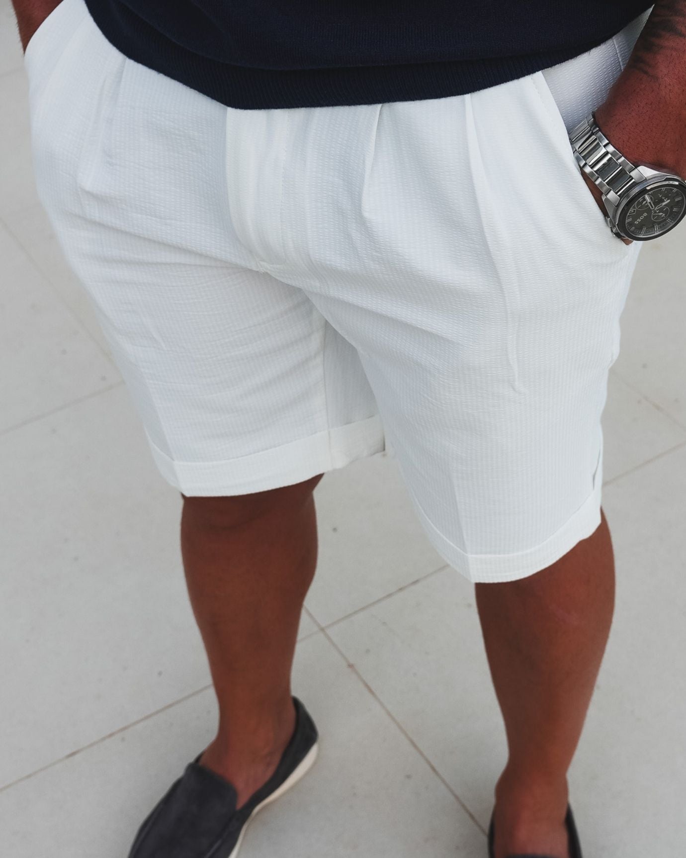 Lightweight white Paris shorts with moisture-wicking material