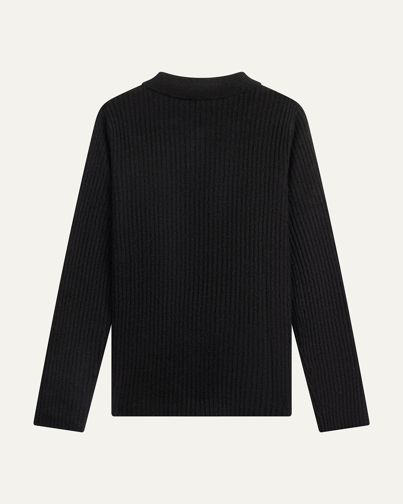 Black ribbed sweater on a light gray background