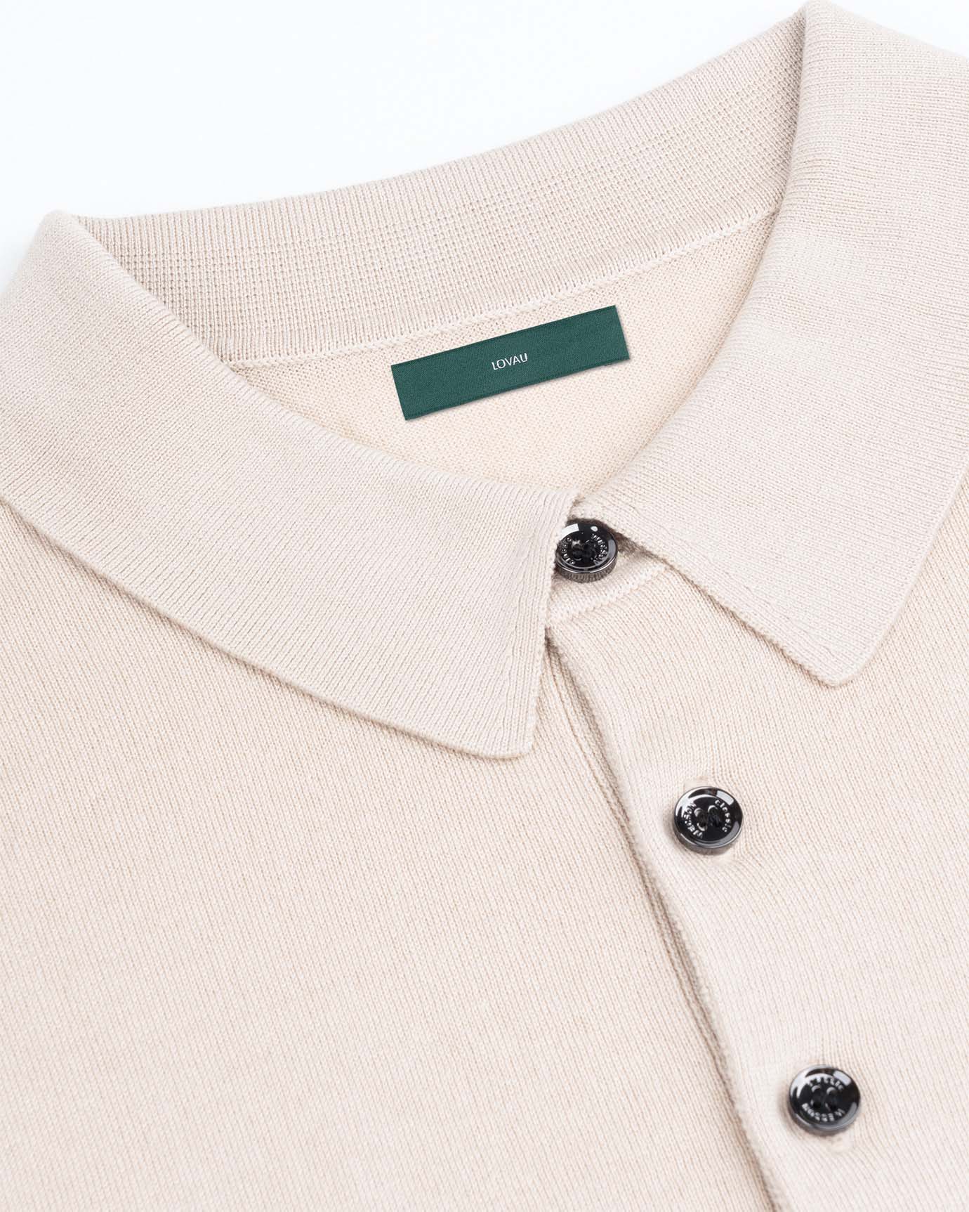 Detail of buttons and collar on light beige silk‑cashmere polo