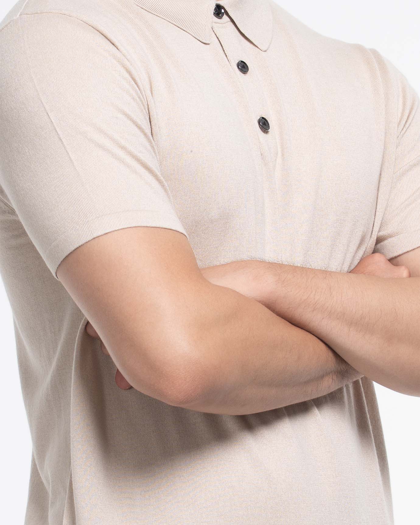 Back view of light beige short‑sleeve silk‑cashmere polo