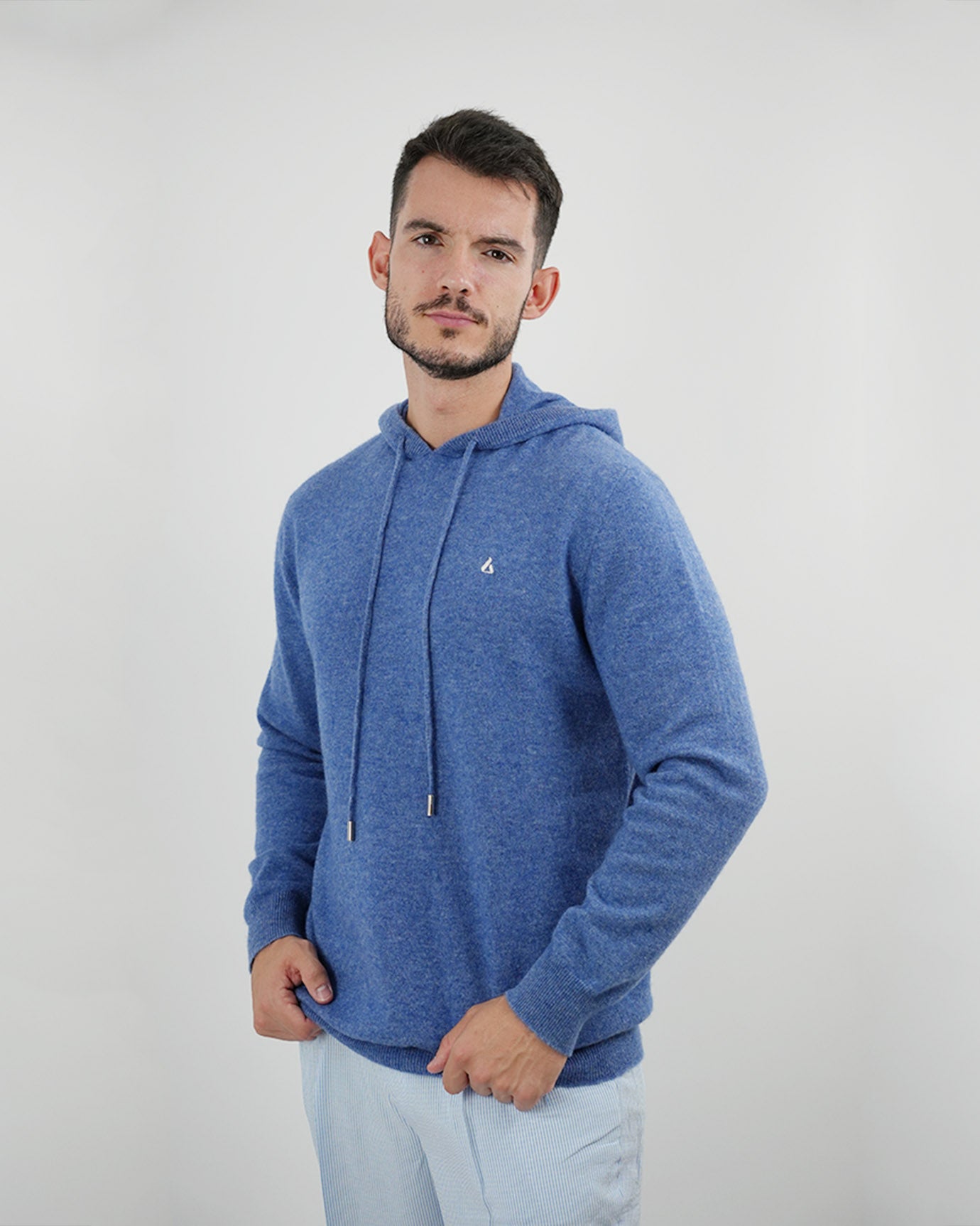 Close-up of Lovau Cashmere Hoodie showing luxurious cashmere texture and detailed flower logo