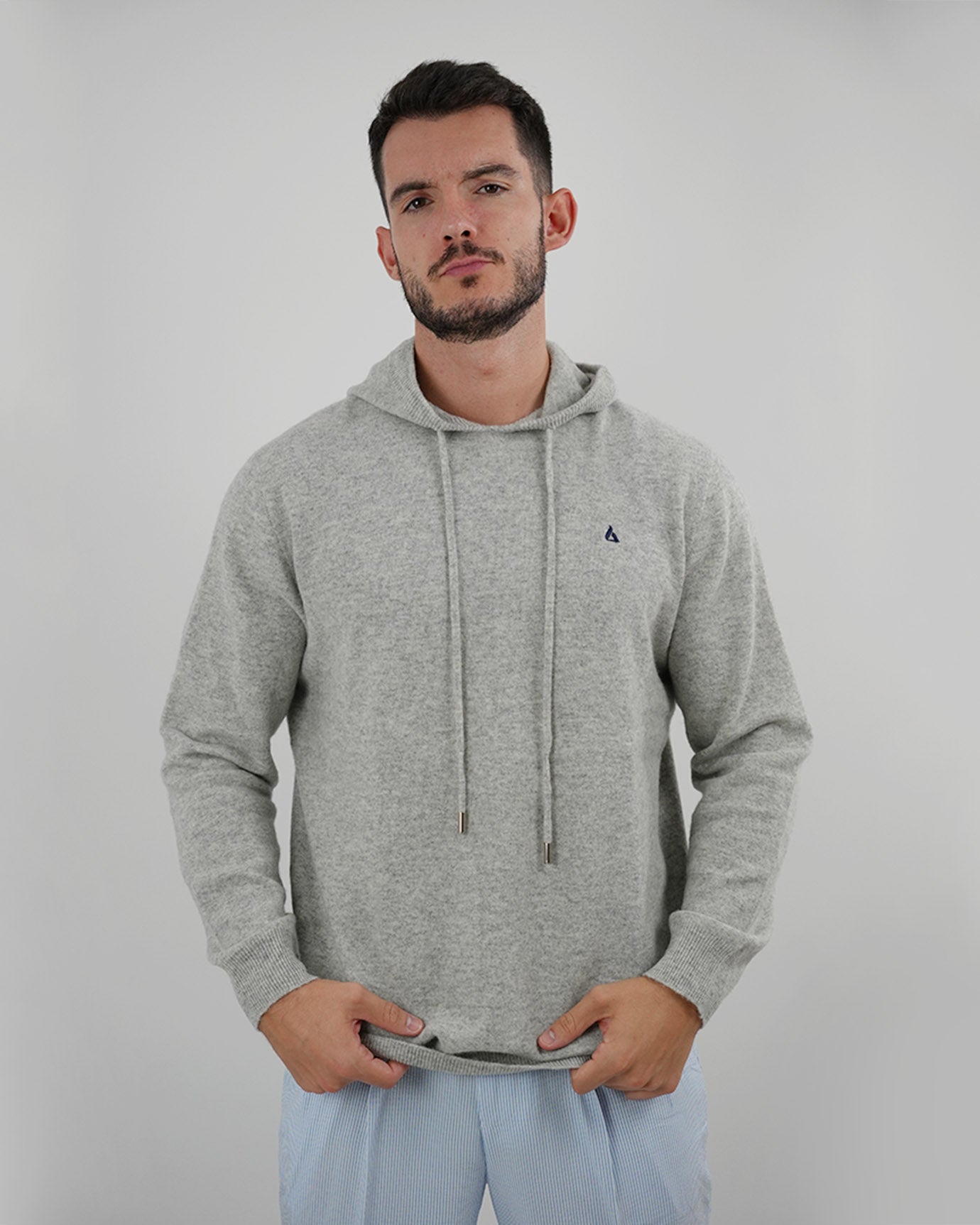 Casual streetwear look with gray hoodie and cargo pants