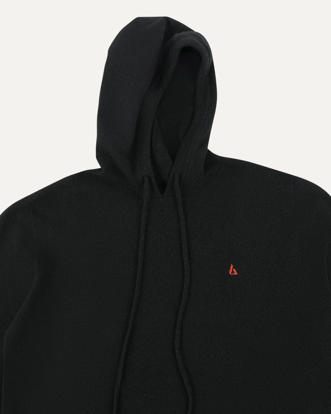 Cuff and hem finish on Lovau hoodie with red branding