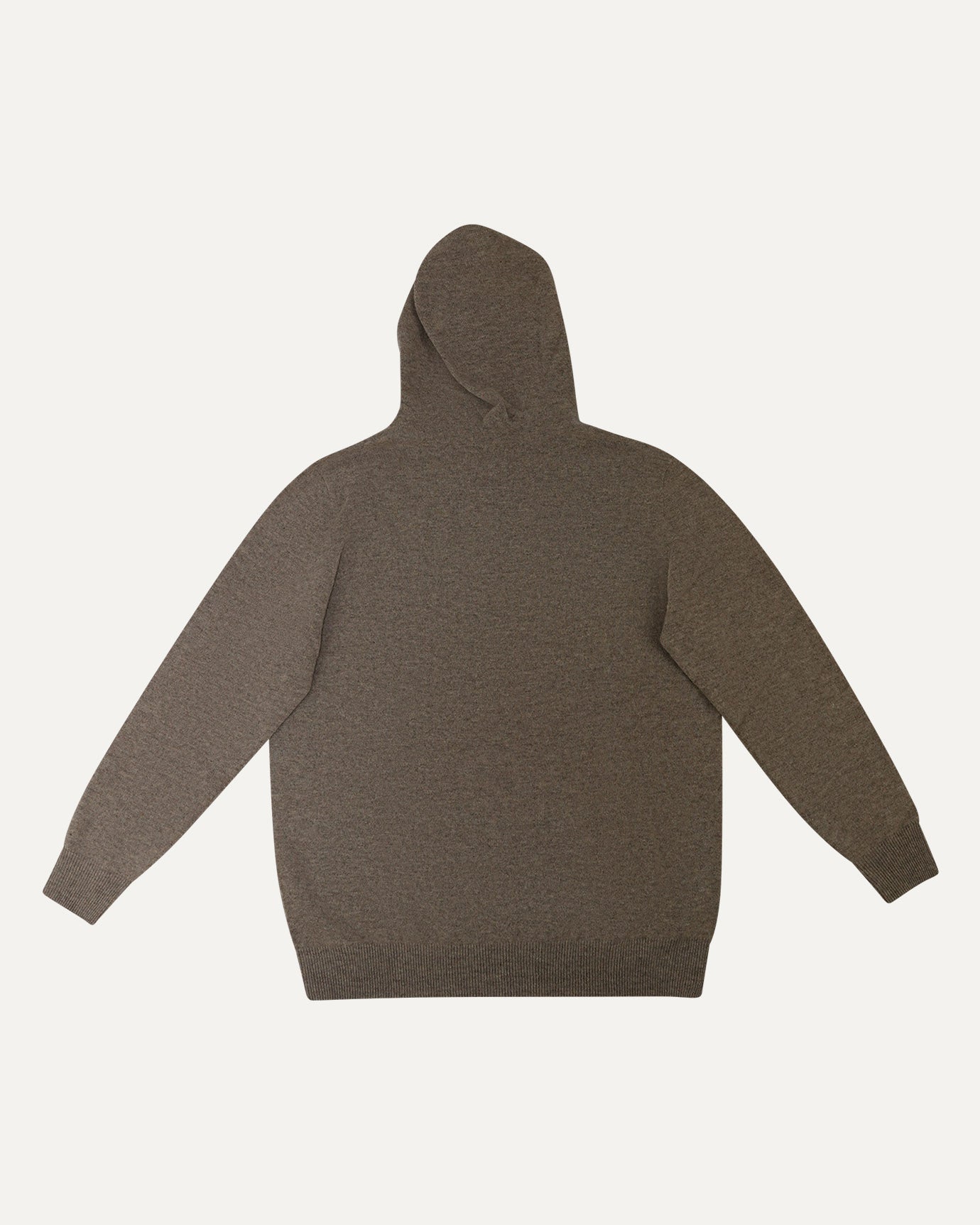 Textured wool fabric of camel hoodie in natural light